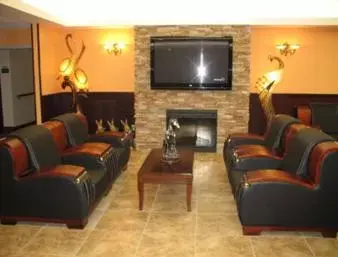 Communal lounge/ TV room, Seating Area in Days Inn by Wyndham Athabasca