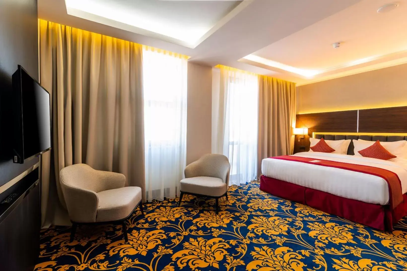 Bed in Ramada Hotel & Suites by Wyndham Yerevan