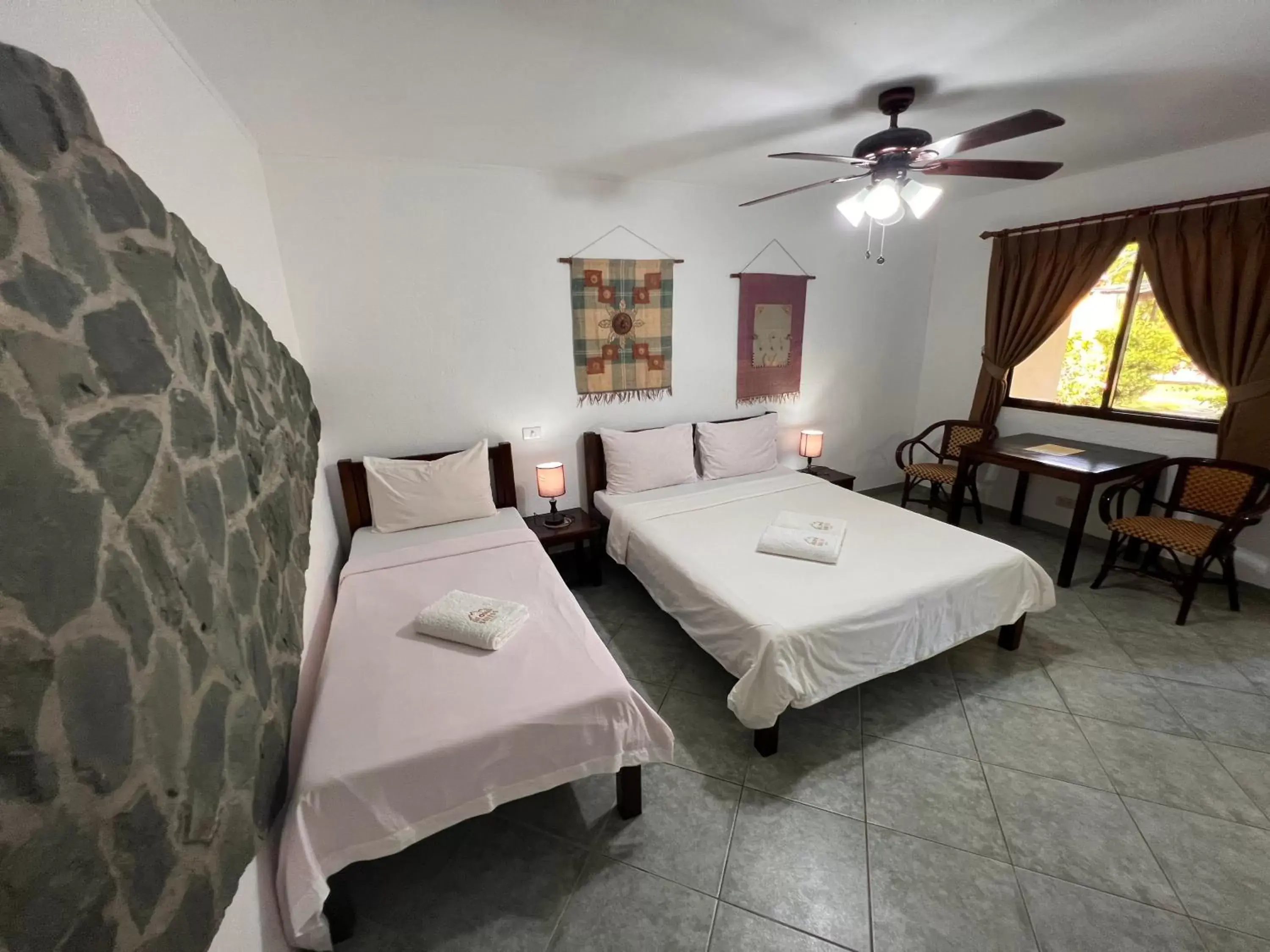 Bed in Alona Swiss Resort Bed in Alona Swiss Resort