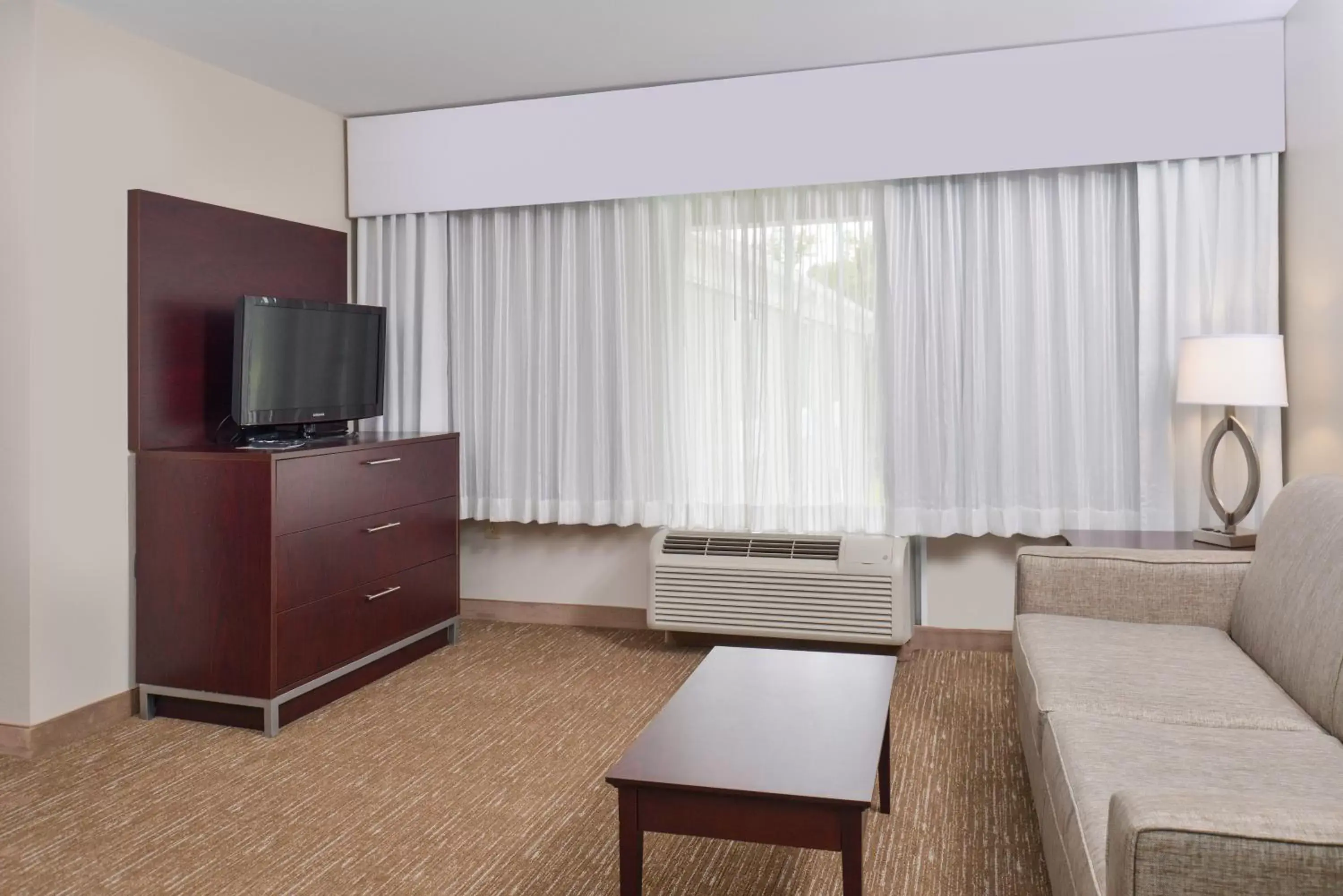 Photo of the whole room, TV/Entertainment Center in Holiday Inn Express Hotel & Suites Lafayette, an IHG Hotel