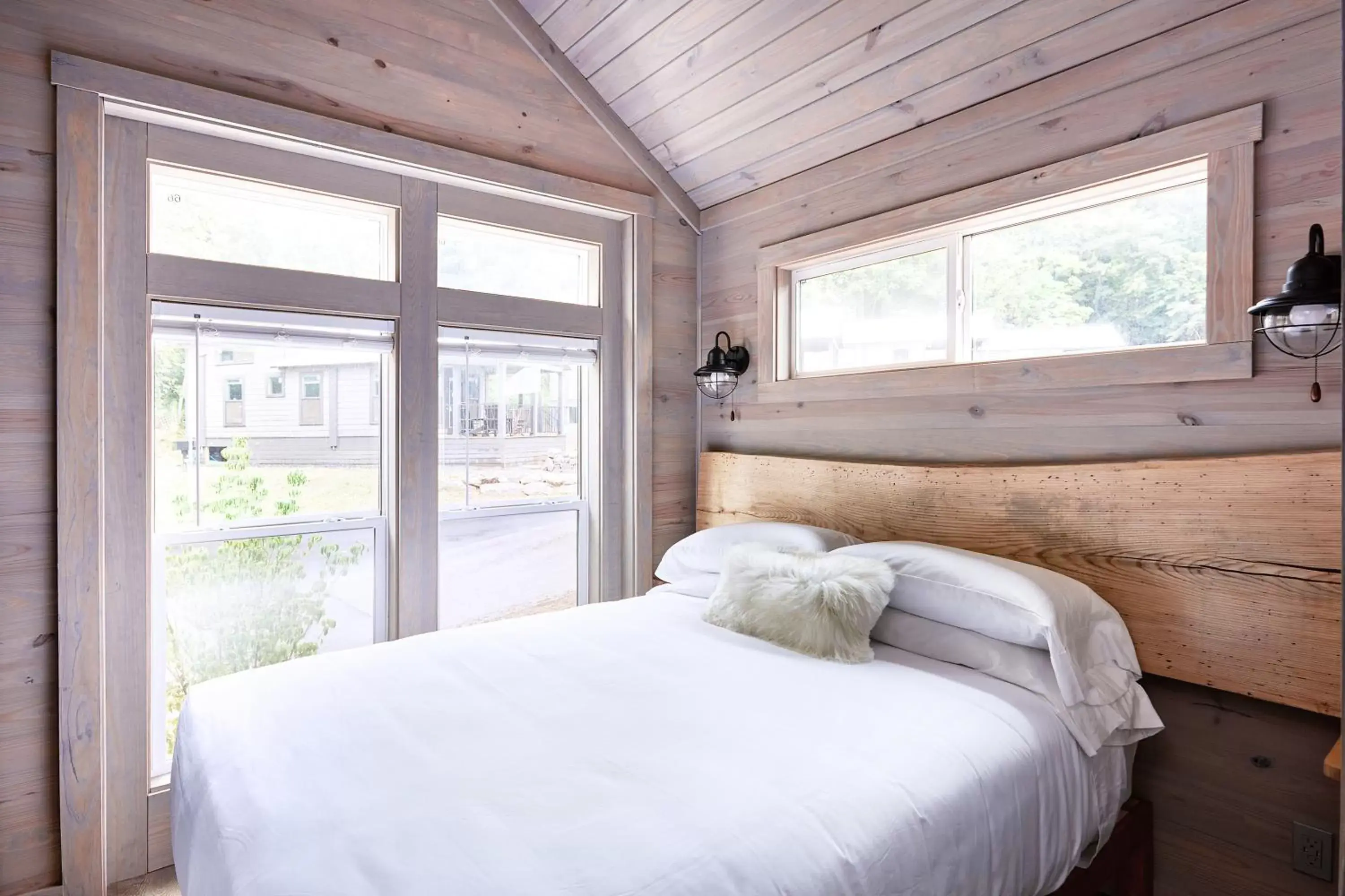 Bed in Asheville River Cabins