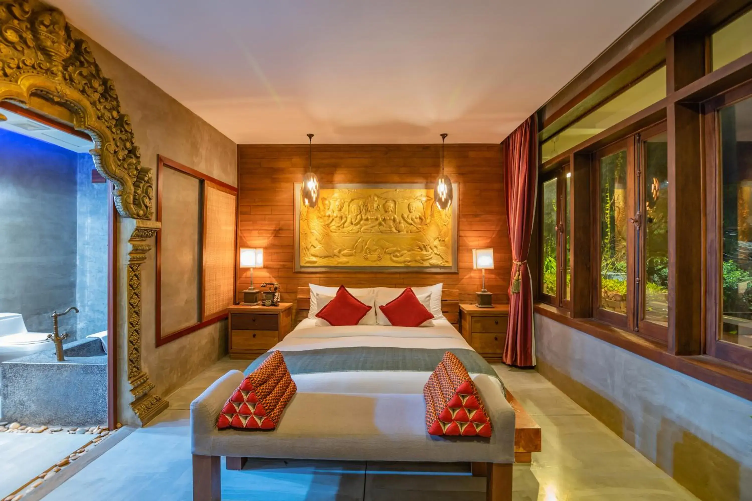 Bed in Cambana d'Angkor Suites