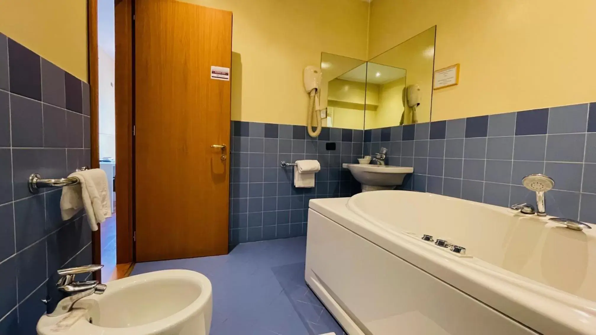 Bathroom in Orzihotel