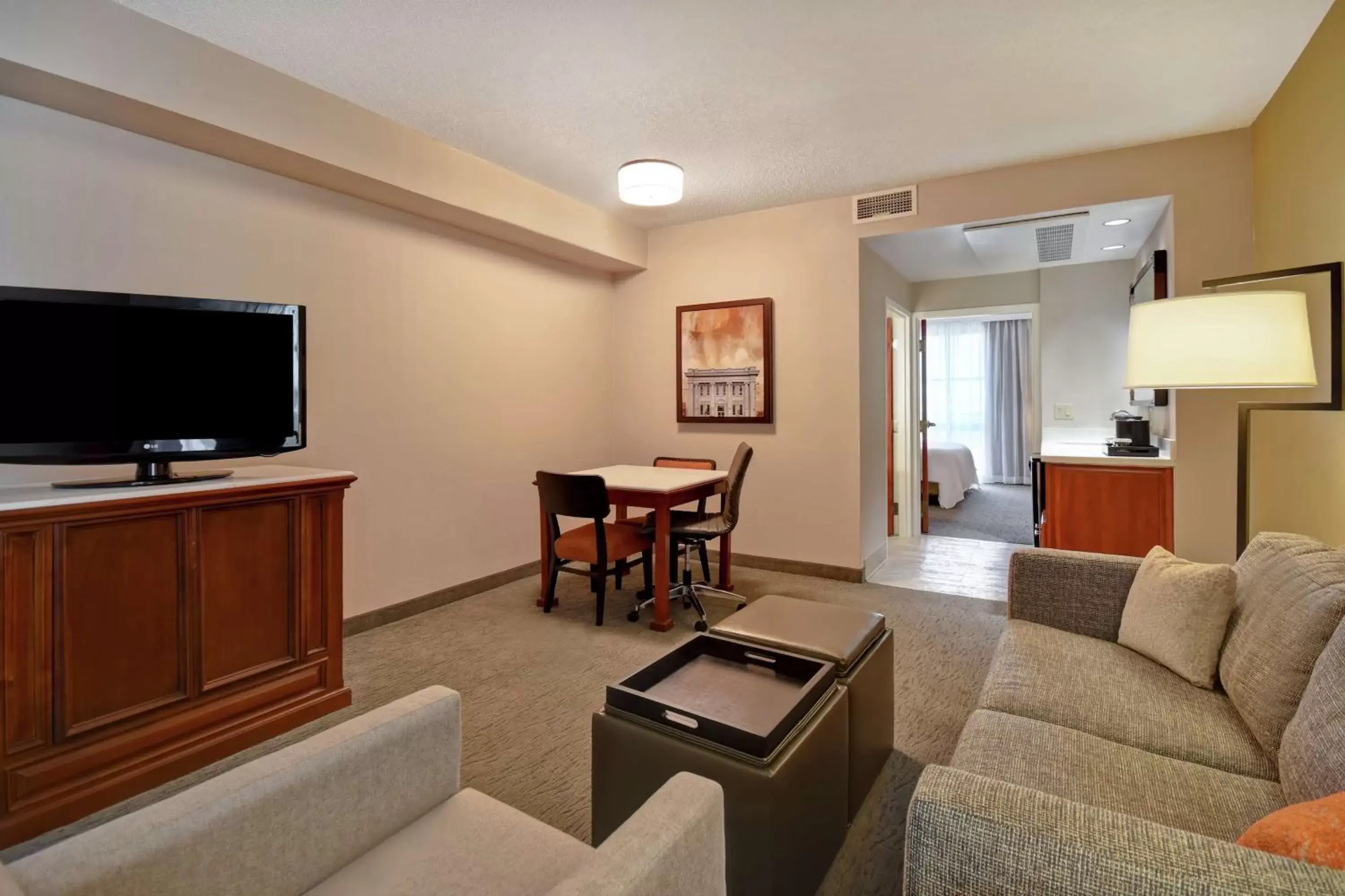 Bedroom, Seating Area in Embassy Suites Little Rock