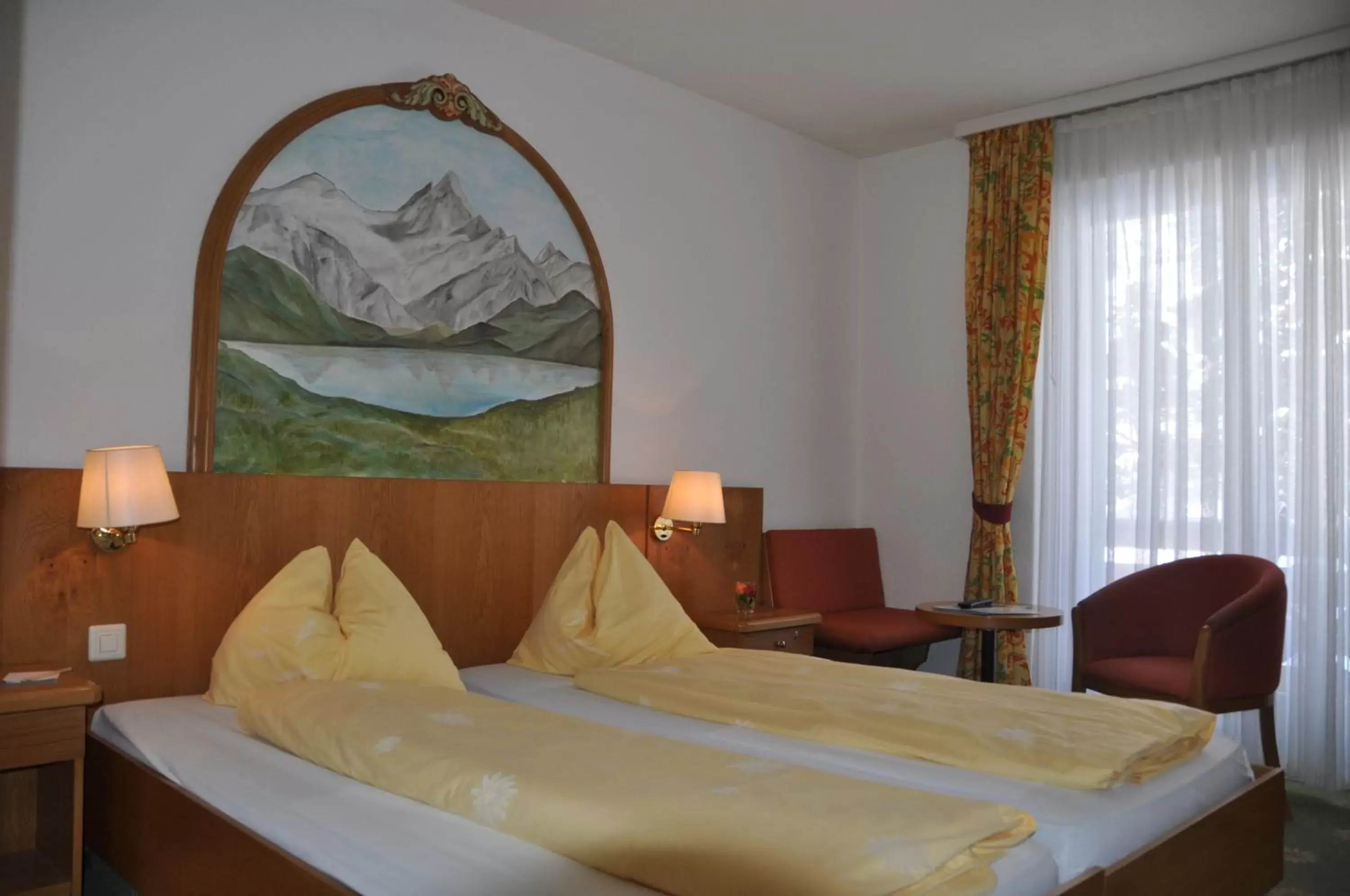 Bed in Hotel Central Wolter - Grindelwald