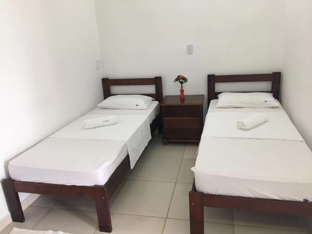 Bed in Pousada Recanto do Teimoso