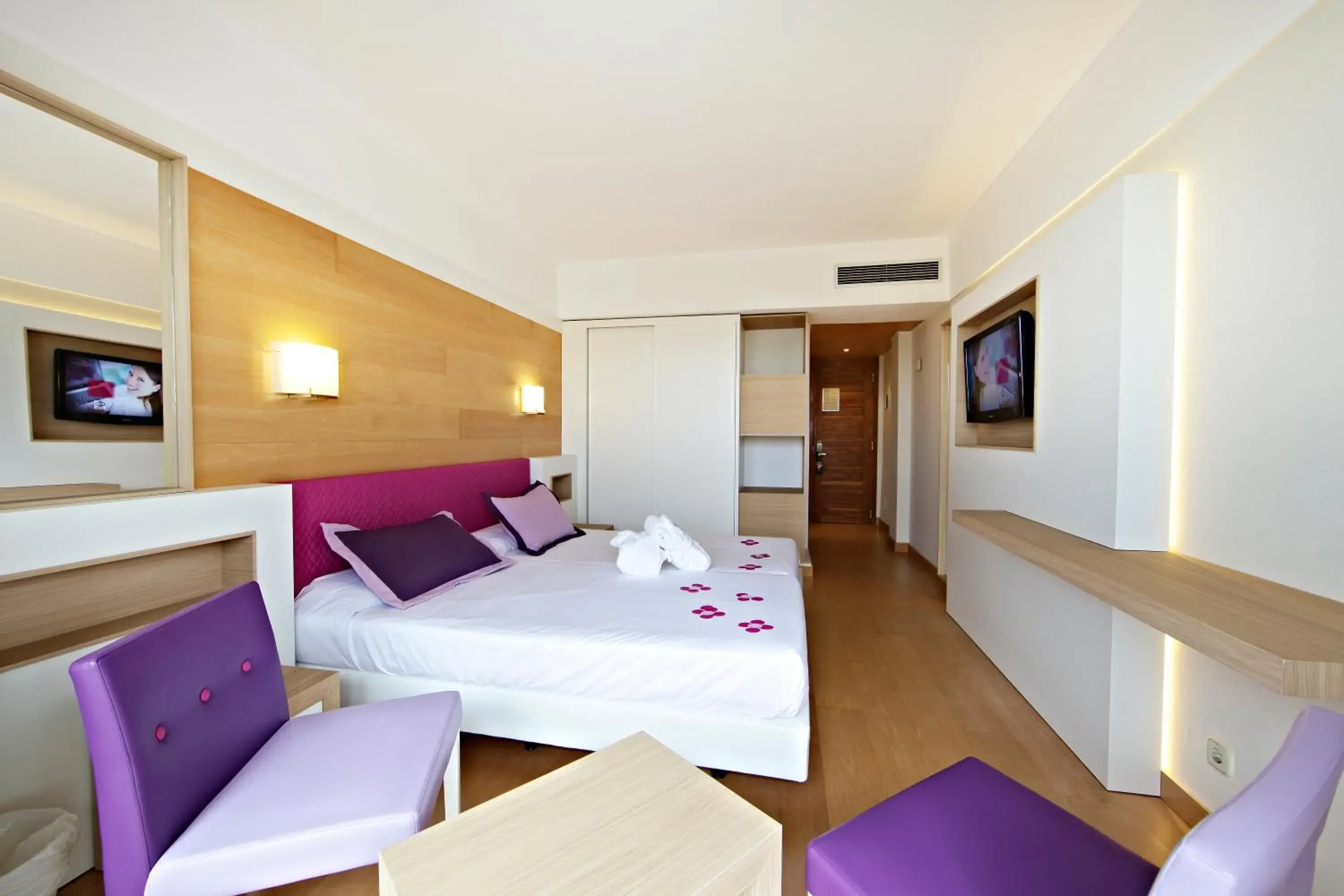 Photo of the whole room, Bed in Hotel & Spa S'Entrador Playa Photo of the whole room, Bed in Hotel & Spa S'Entrador Playa