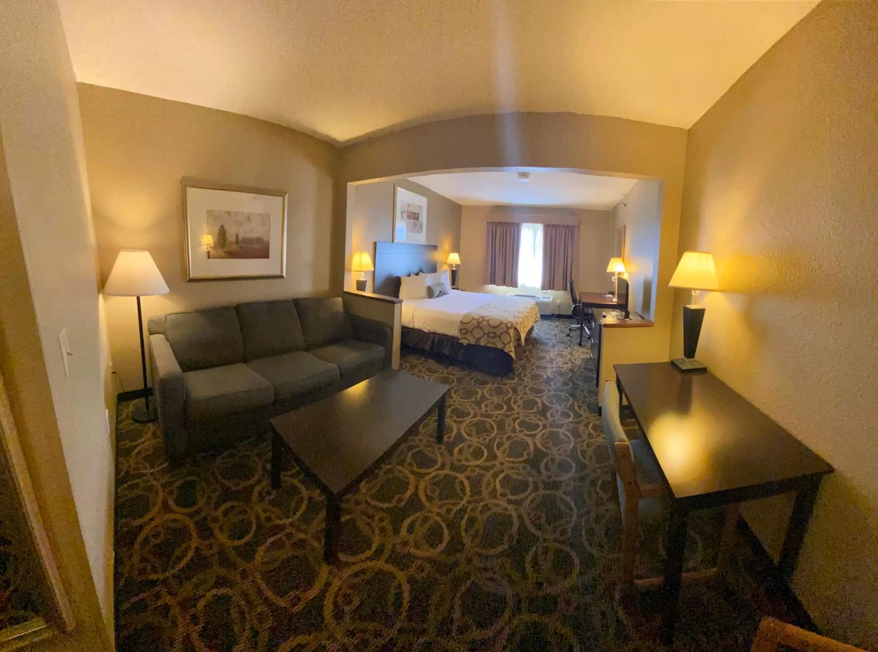 Seating area, Bed in Baymont by Wyndham Casper East