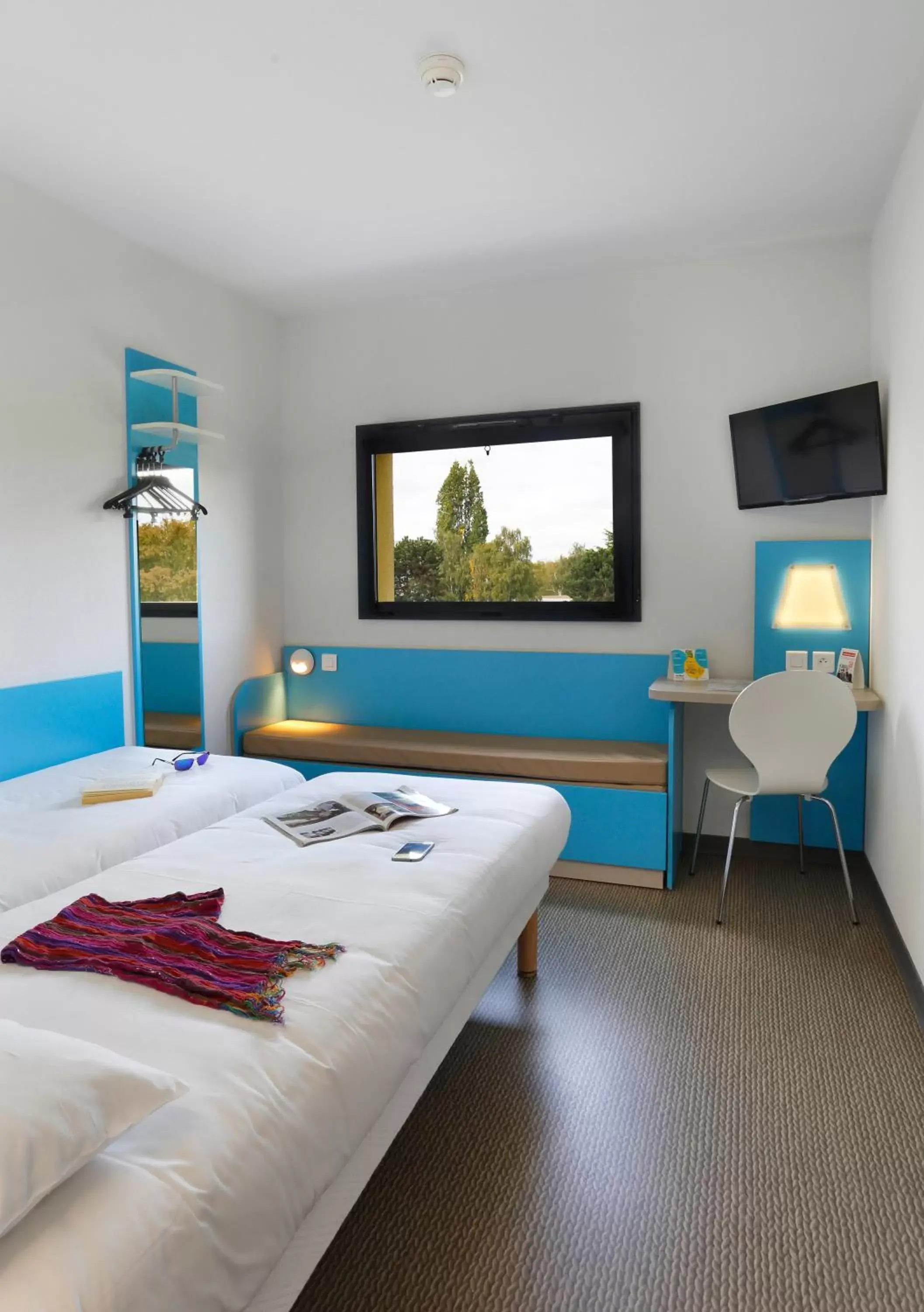 Bed in First Inn Hotel Blois