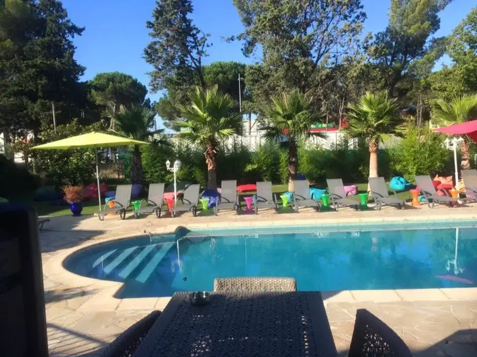 Day, Swimming Pool in Hotel & Restaurant Le Mejean - Parc des Expositions