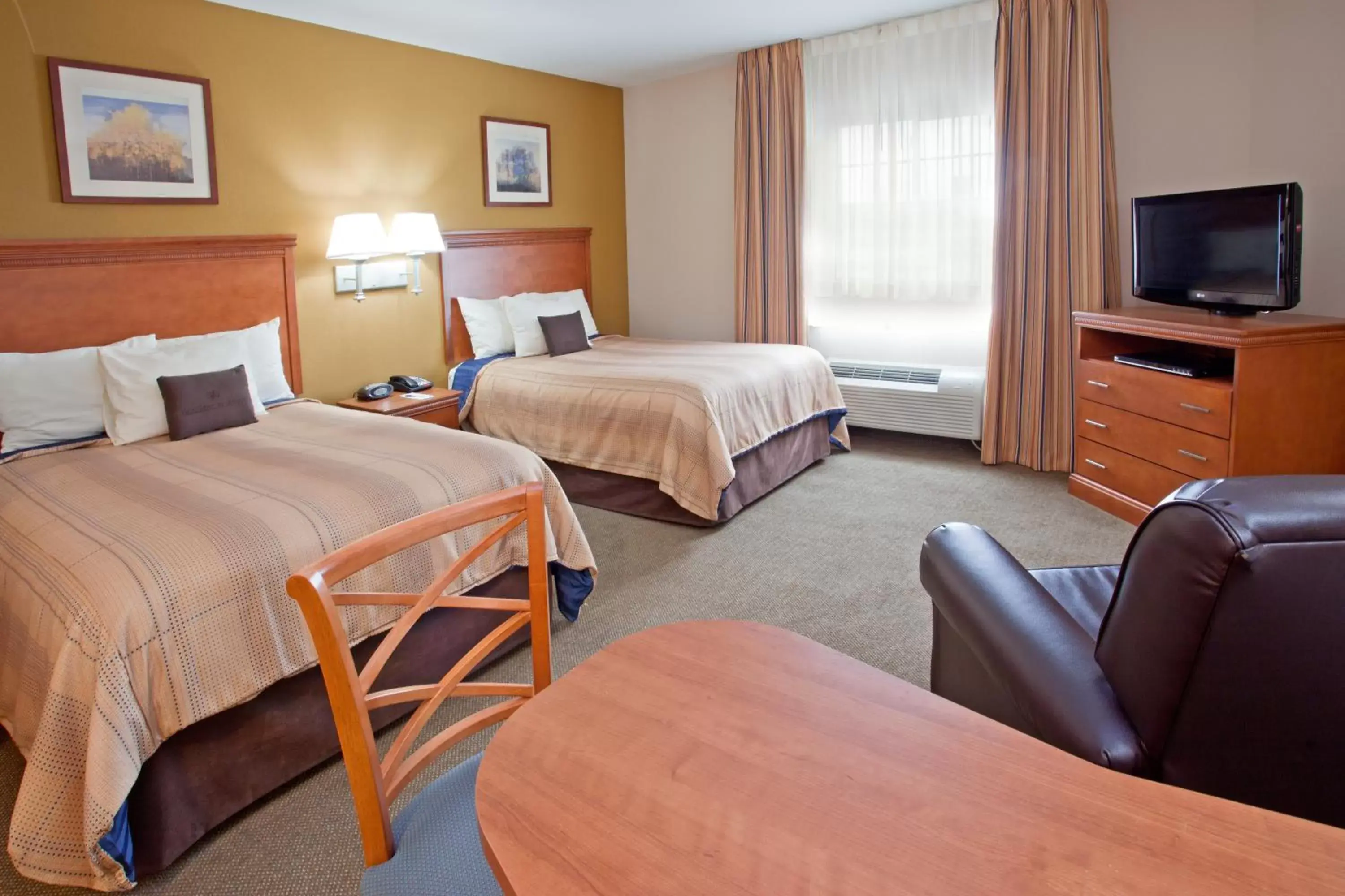 Photo of the whole room, Bed in Candlewood Suites League City, an IHG Hotel