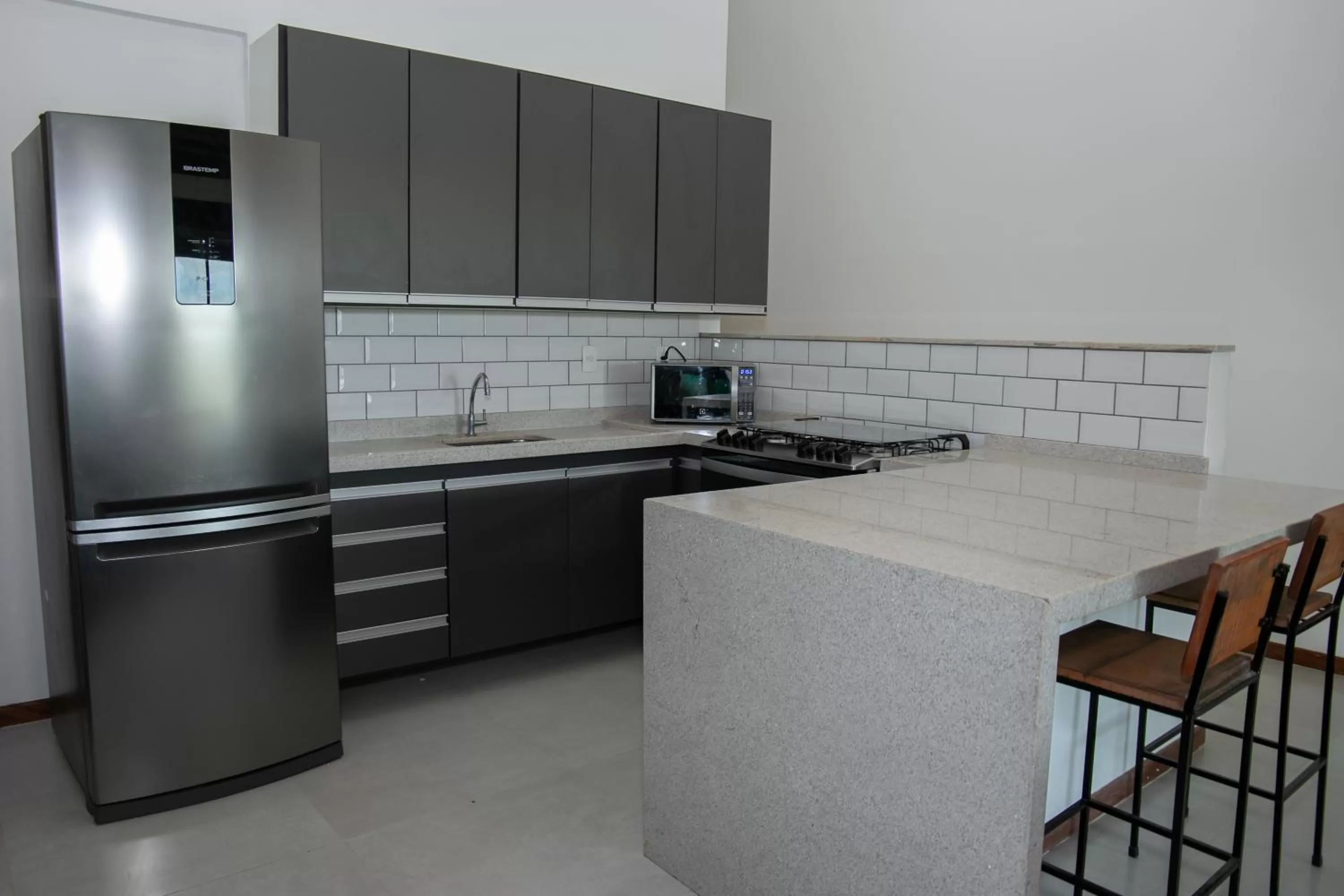 Kitchen or kitchenette in Pousada Peninsula de Buzios