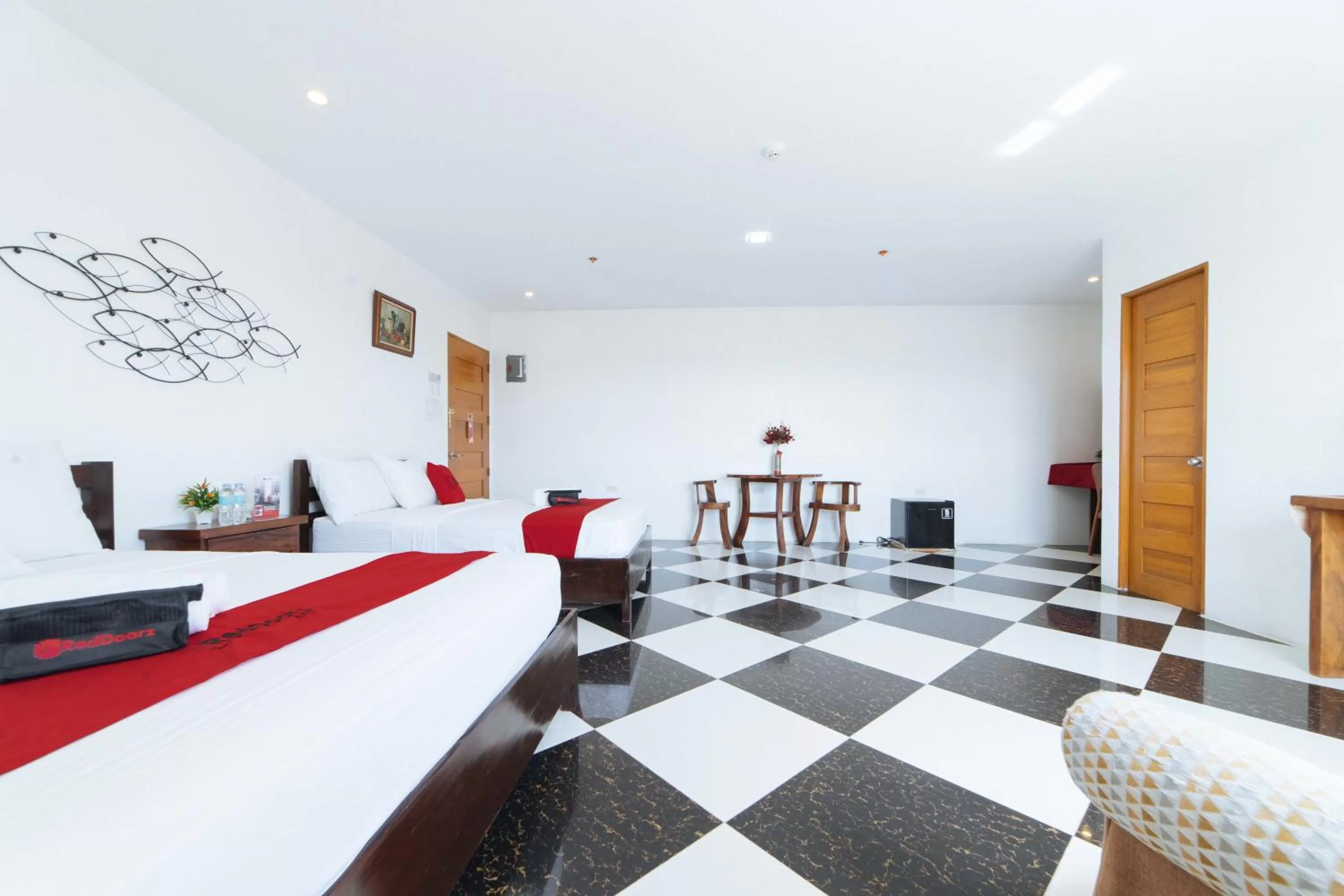 Photo of the whole room, Bed in RedDoorz Plus @ San Roque Roxas City