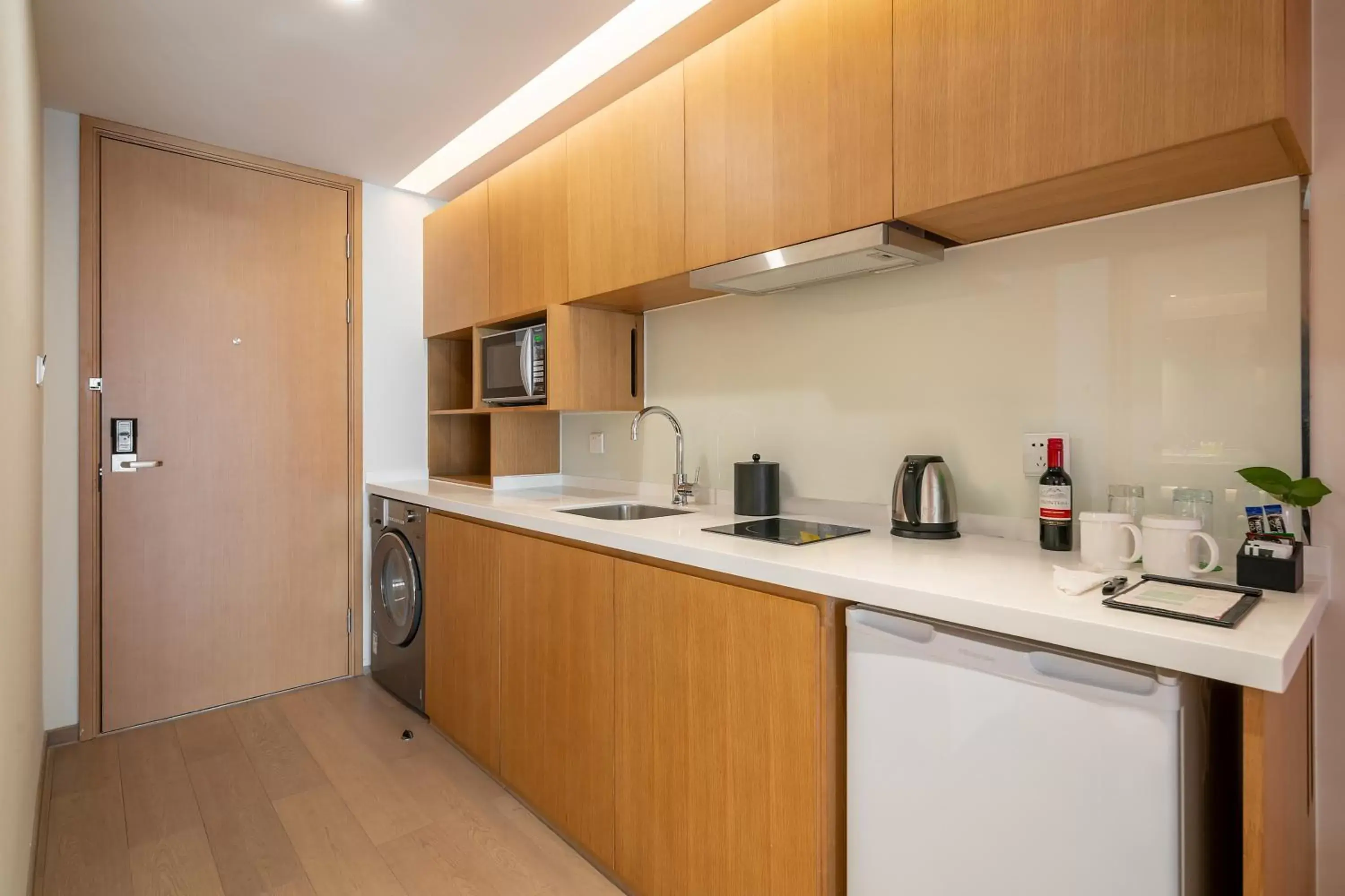 Kitchen or kitchenette, Kitchen/Kitchenette in Holiday Inn Shanghai Hongqiao Central, an IHG Hotel