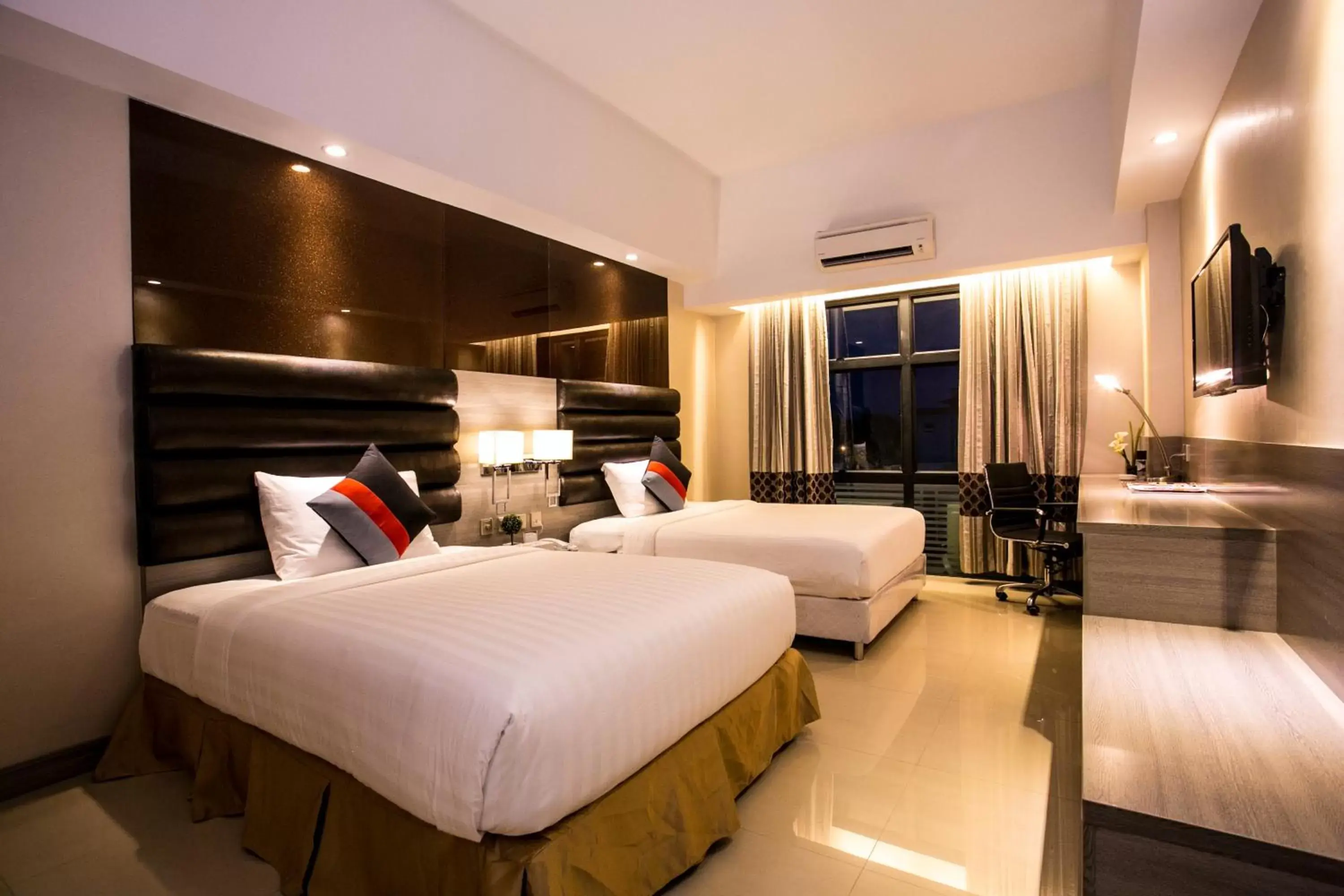 Bedroom in Prime Asia Hotel