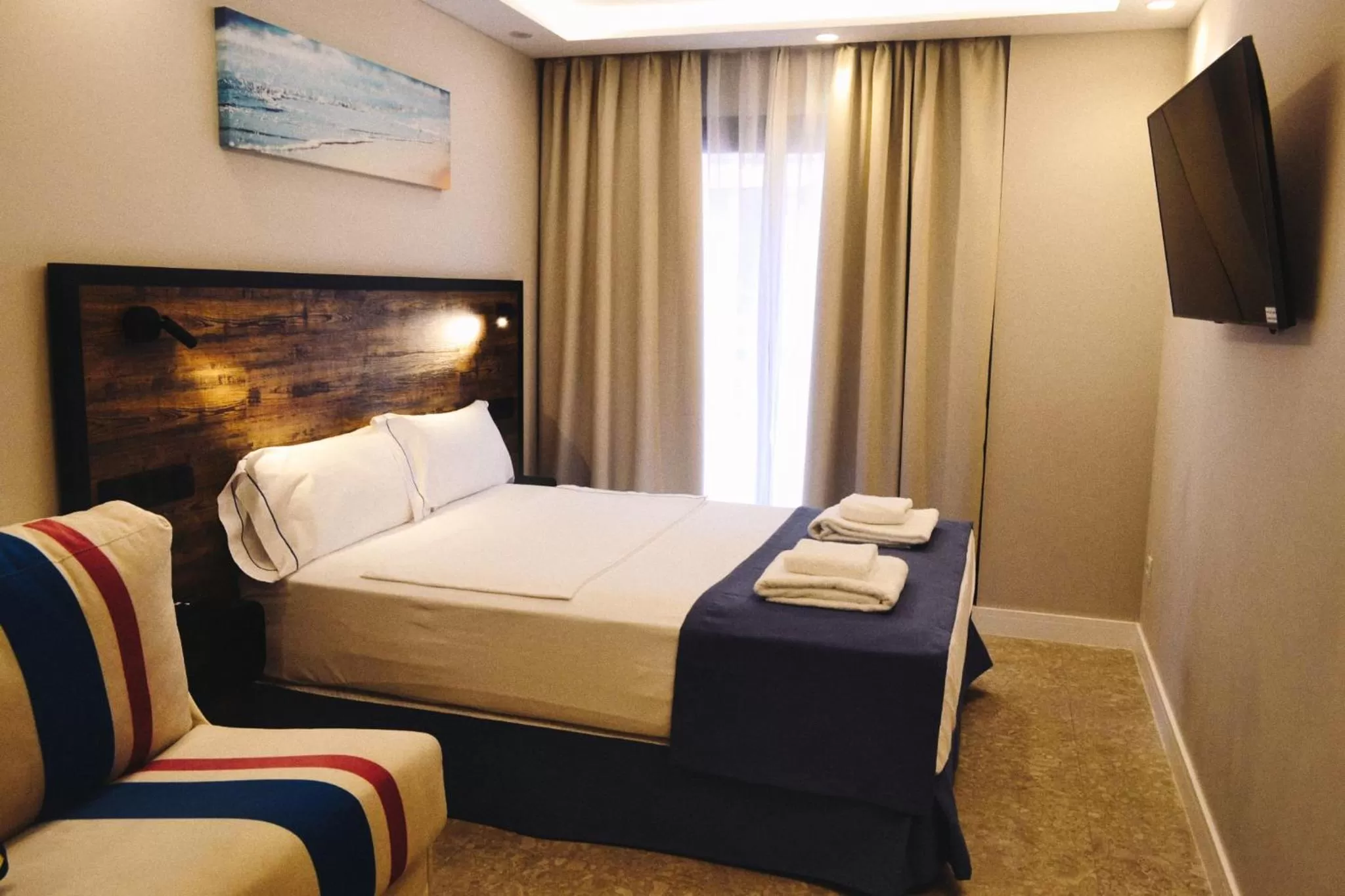 Bed in Posidonia Aparthotel