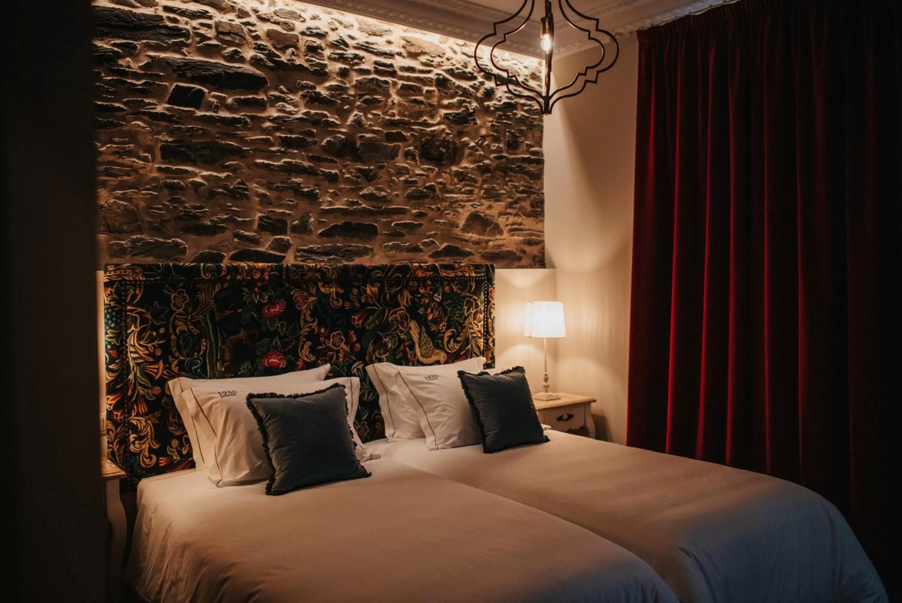 Bed in 1930 Boutique Hotel