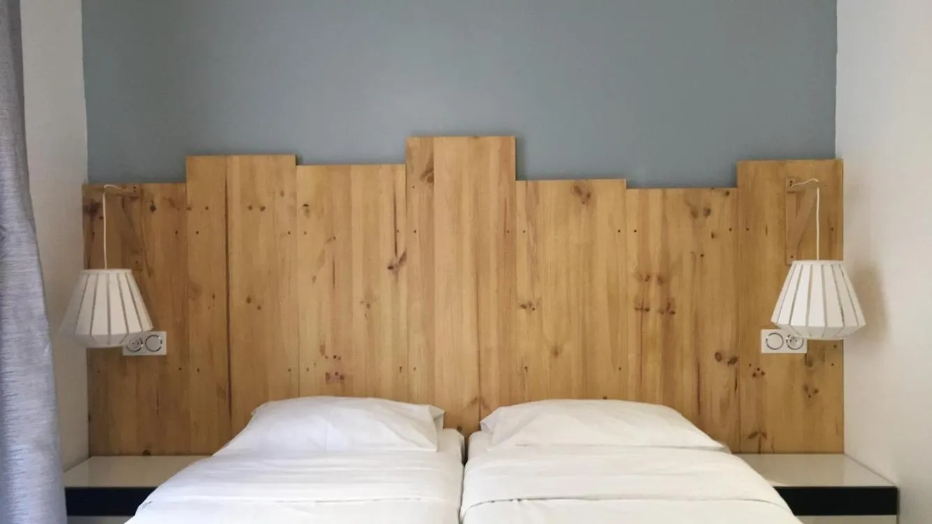 Photo of the whole room, Bed in Hôtel du Maine