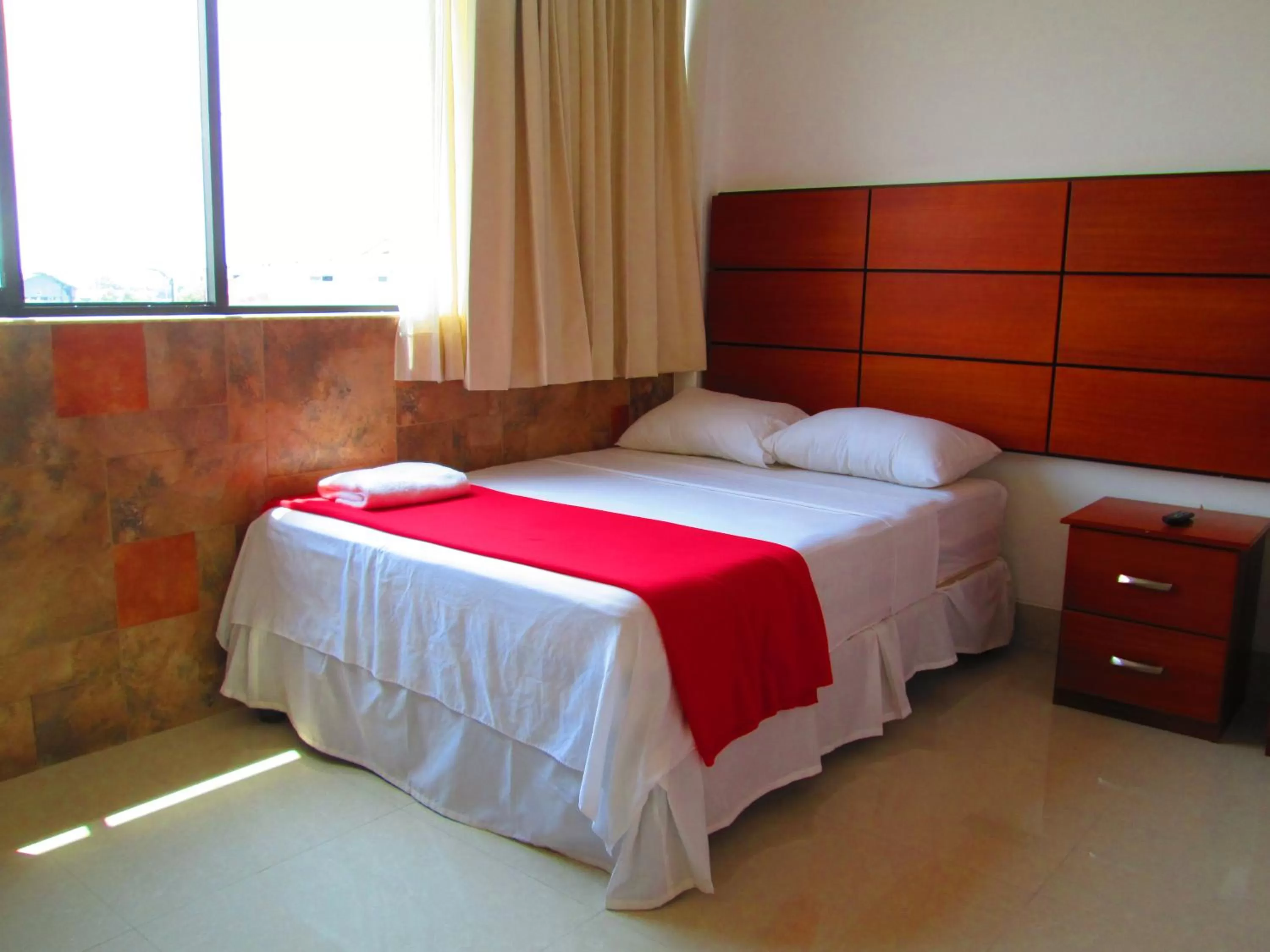 Photo of the whole room, Bed in Hotel Apart Guayaquil Aeropuerto