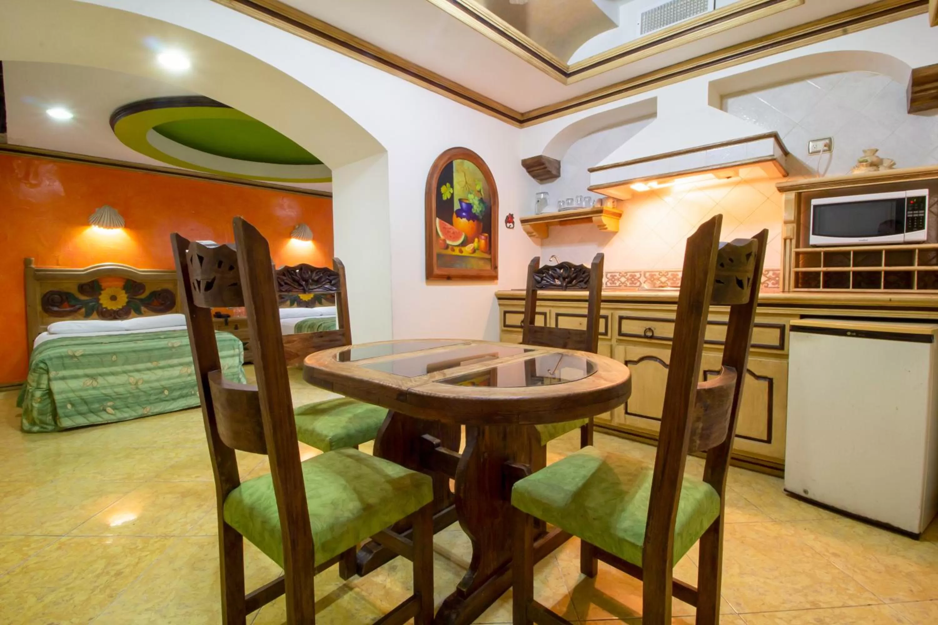 Kitchen or kitchenette in Suites Flamboyanes