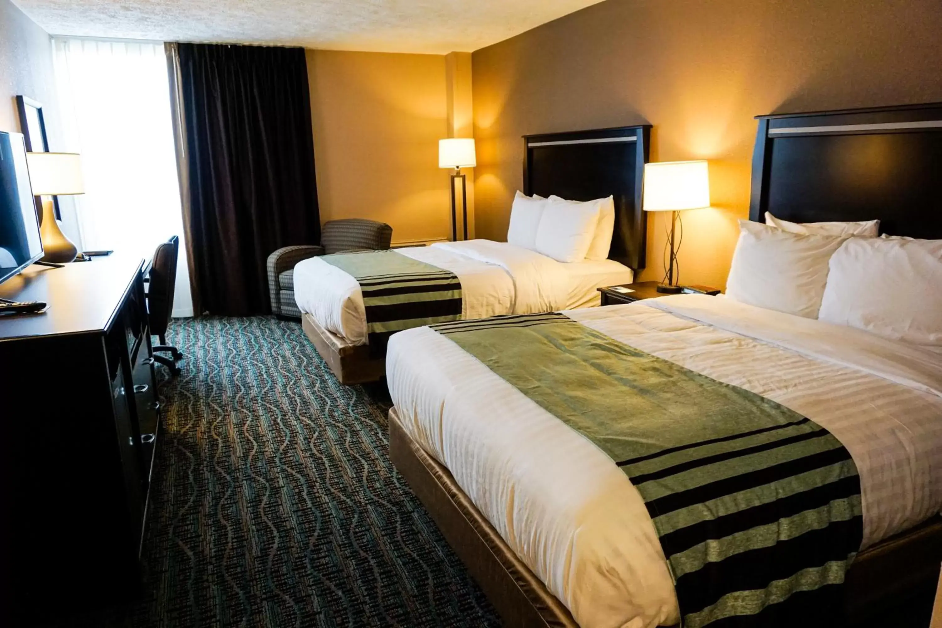 Bedroom, Bed in Boarders Inn & Suites by Cobblestone Hotels - Grand Island