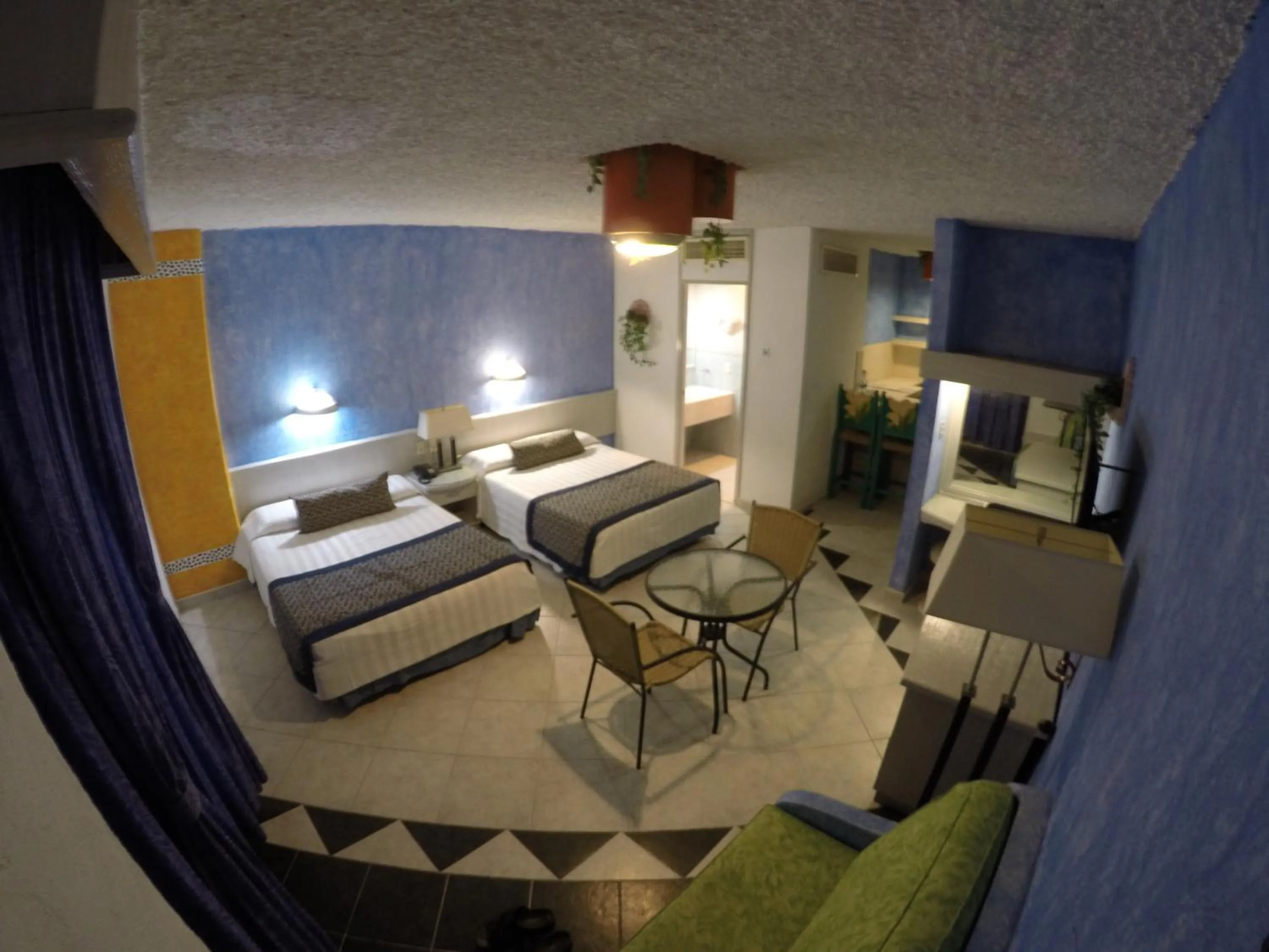 Photo of the whole room, Bed in Hotel Club del Sol Acapulco by NG Hoteles