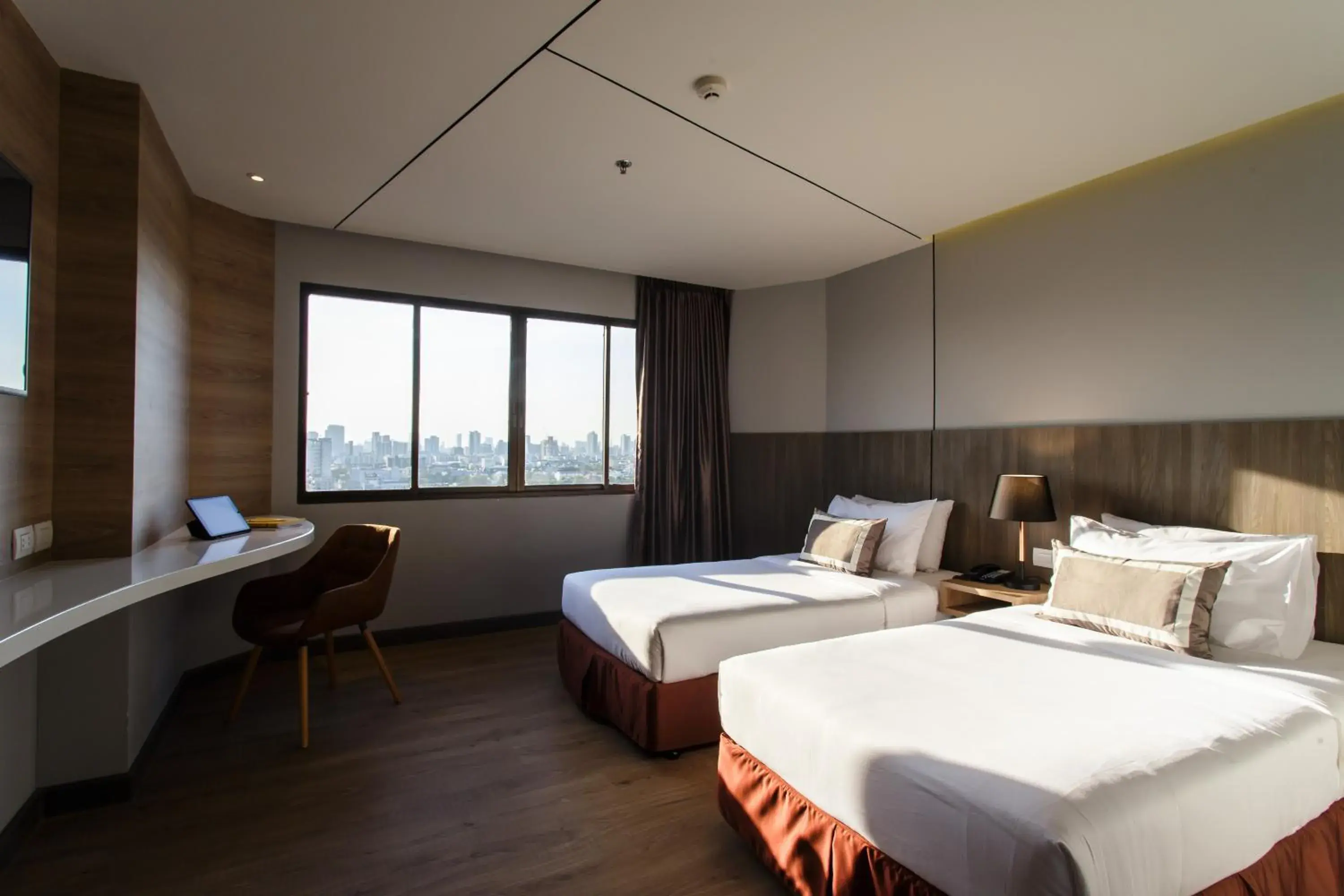 Bedroom in Jazzotel Bangkok- SHA Extra Plus