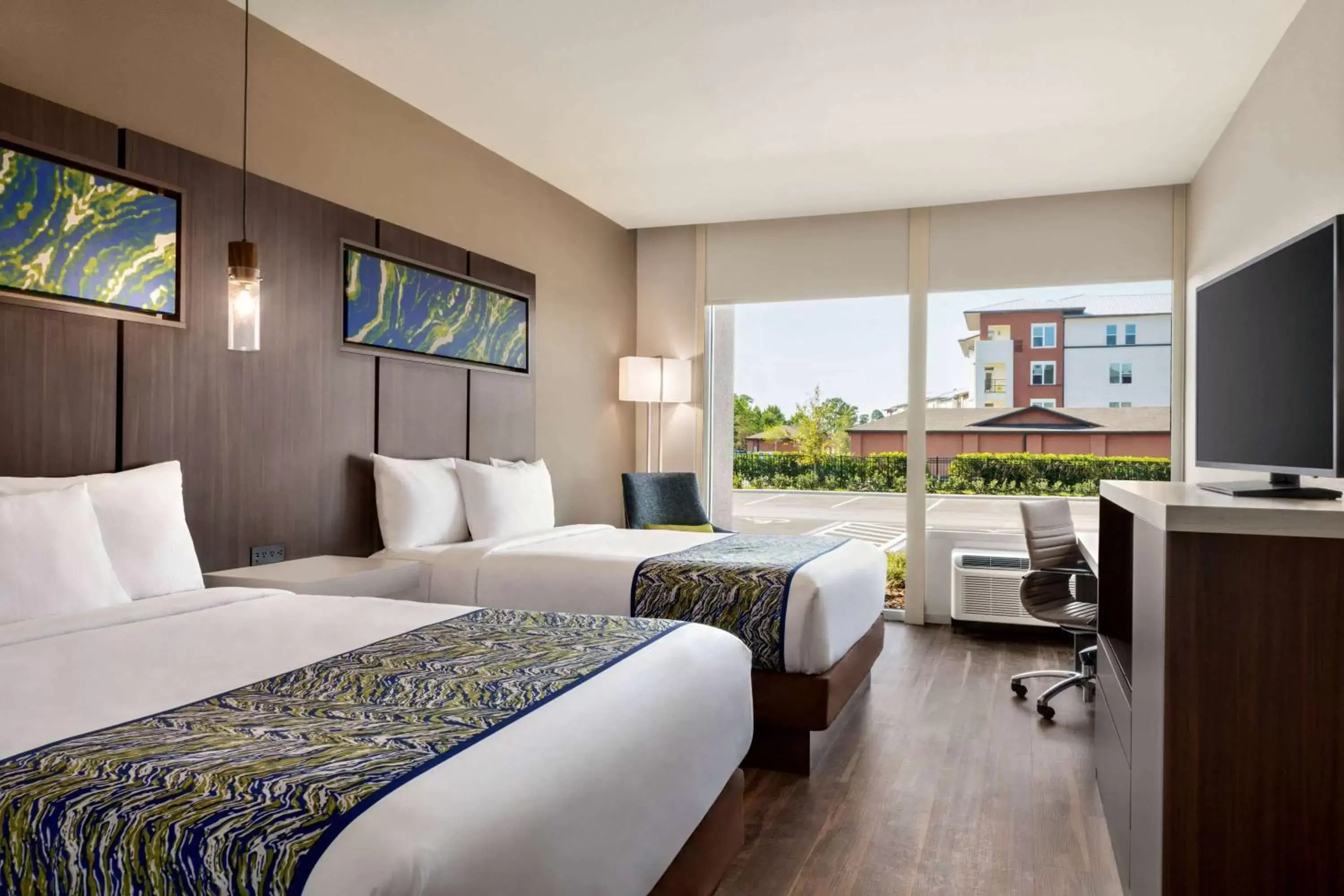 Photo of the whole room, Bed in La Quinta Inn & Suites by Wyndham Orlando I-Drive Theme Parks