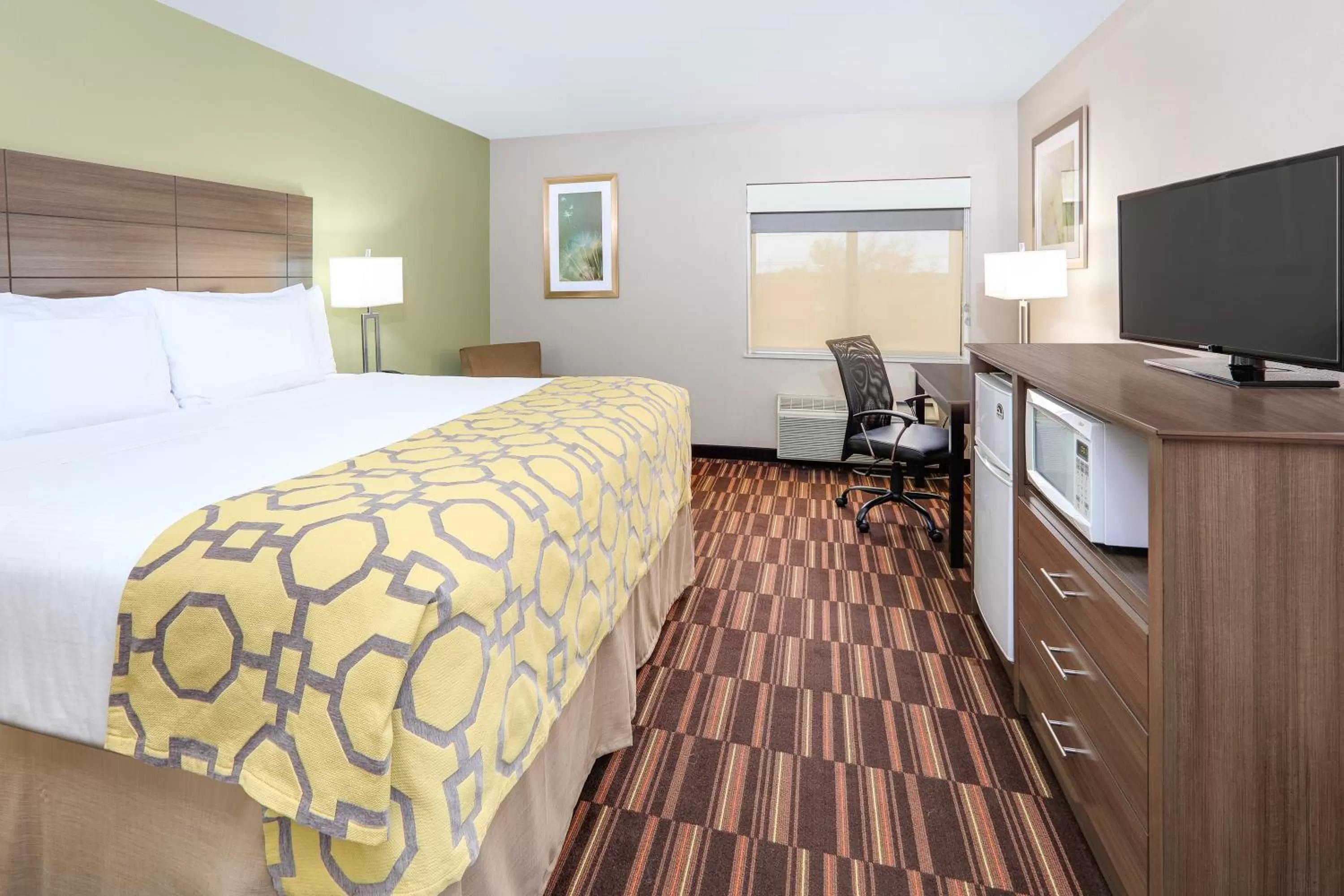 Bed in Baymont by Wyndham Plano