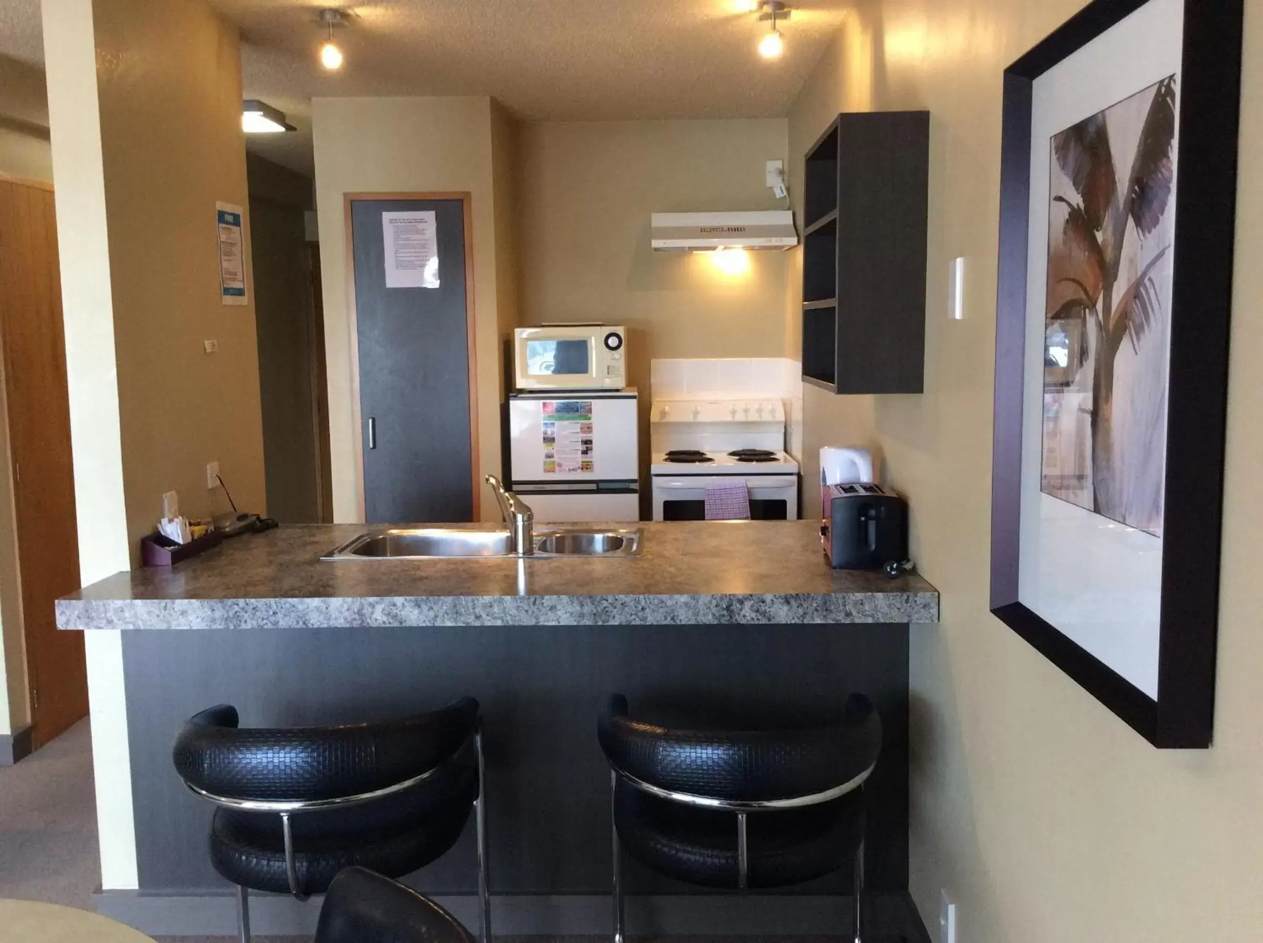 Kitchen or kitchenette in The Lofts Apartments