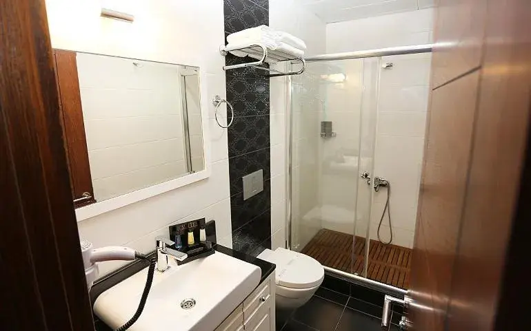 Bathroom in K Suites Hotel