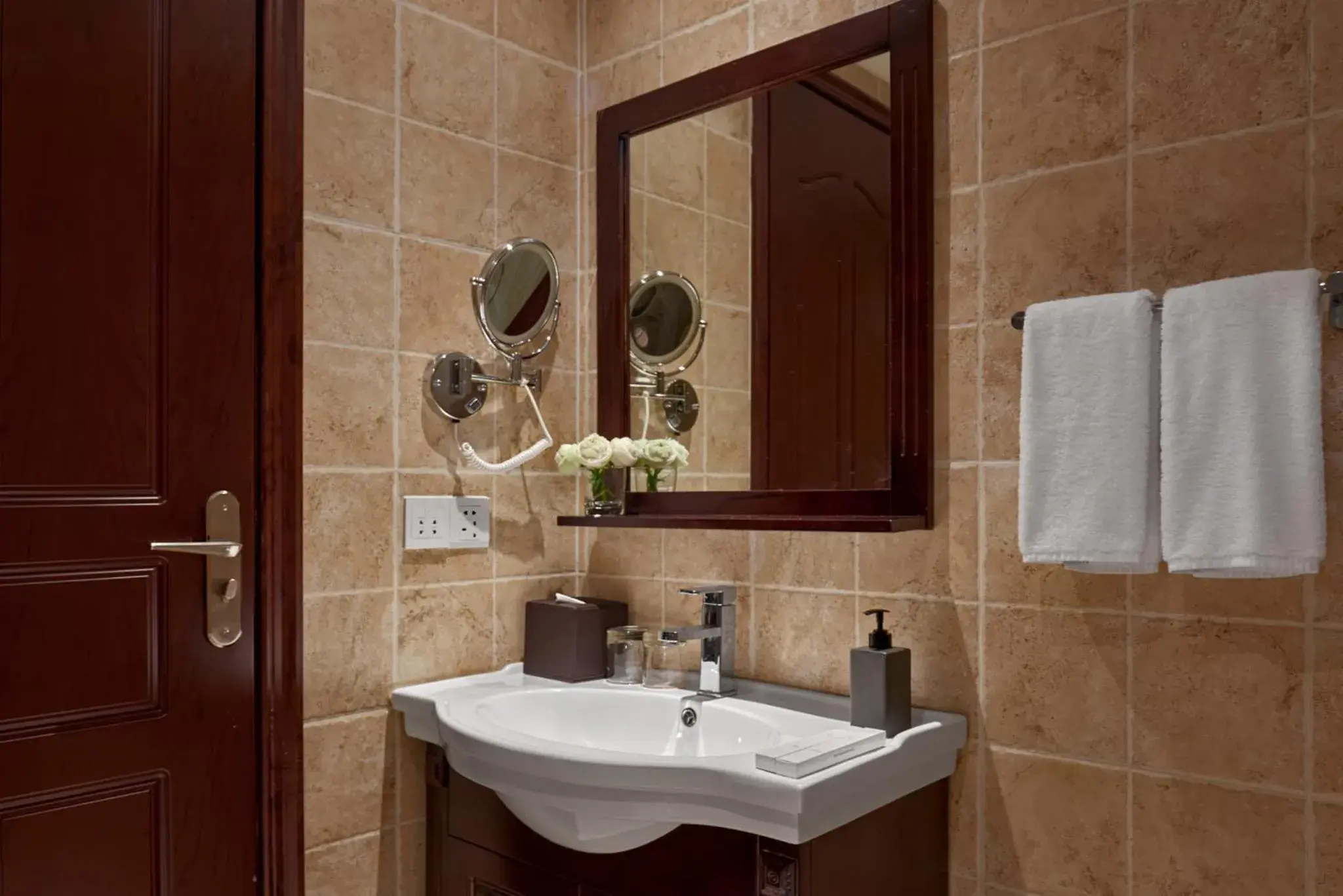 Bathroom in Olympia City Hotel by Dara