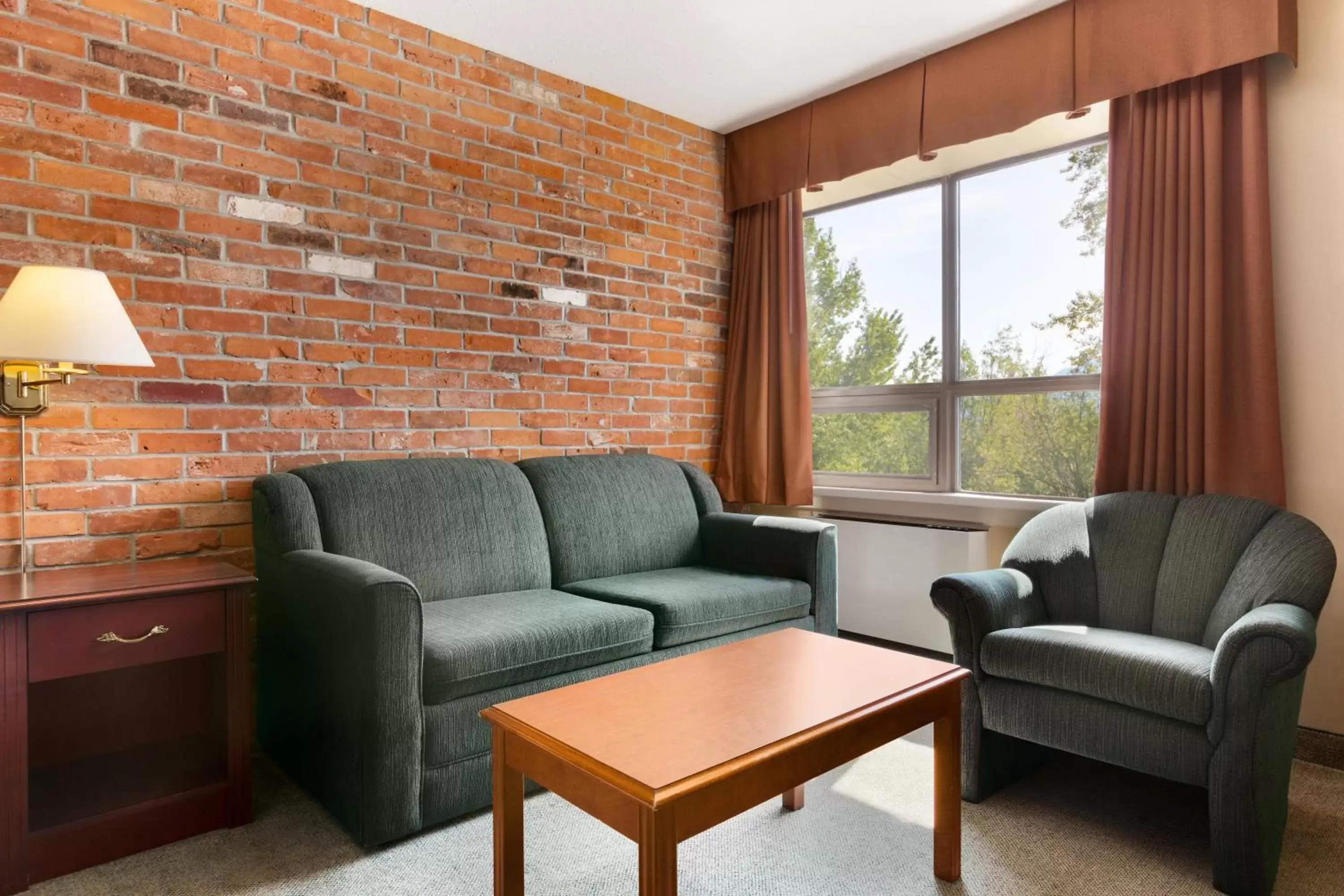 Seating Area in Travelodge by Wyndham North Bay Lakeshore