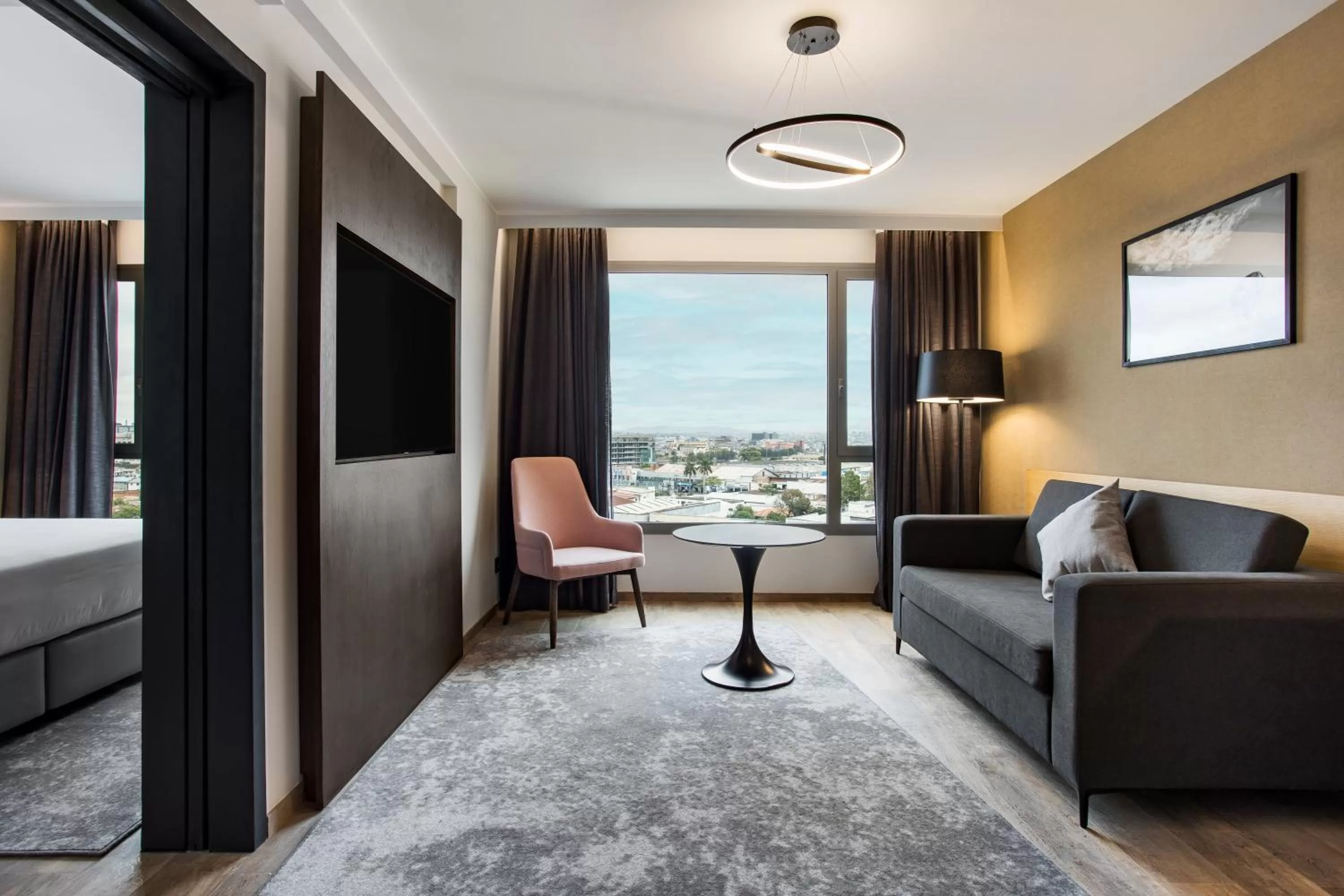 Living room, Bed in Radisson Blu Hotel Antananarivo Waterfront