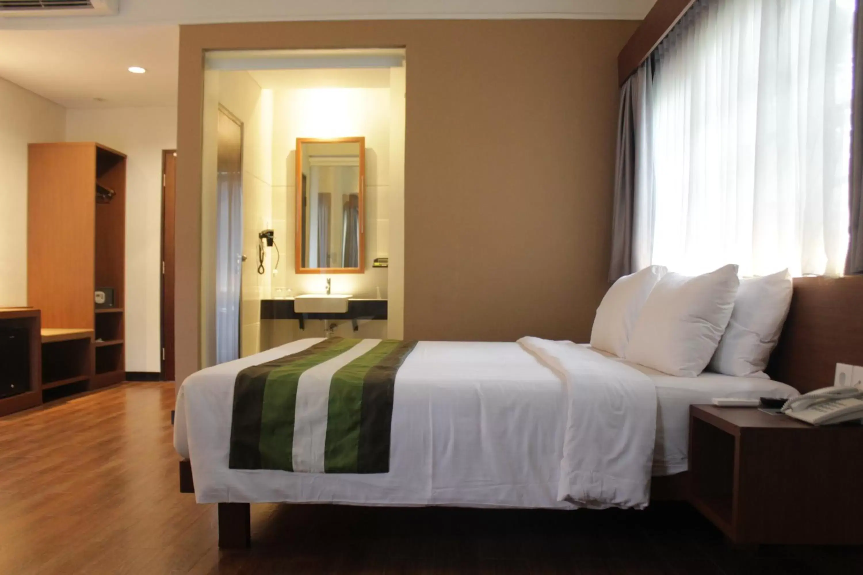 Bed in Grand Whiz Hotel Nusa Dua Bali