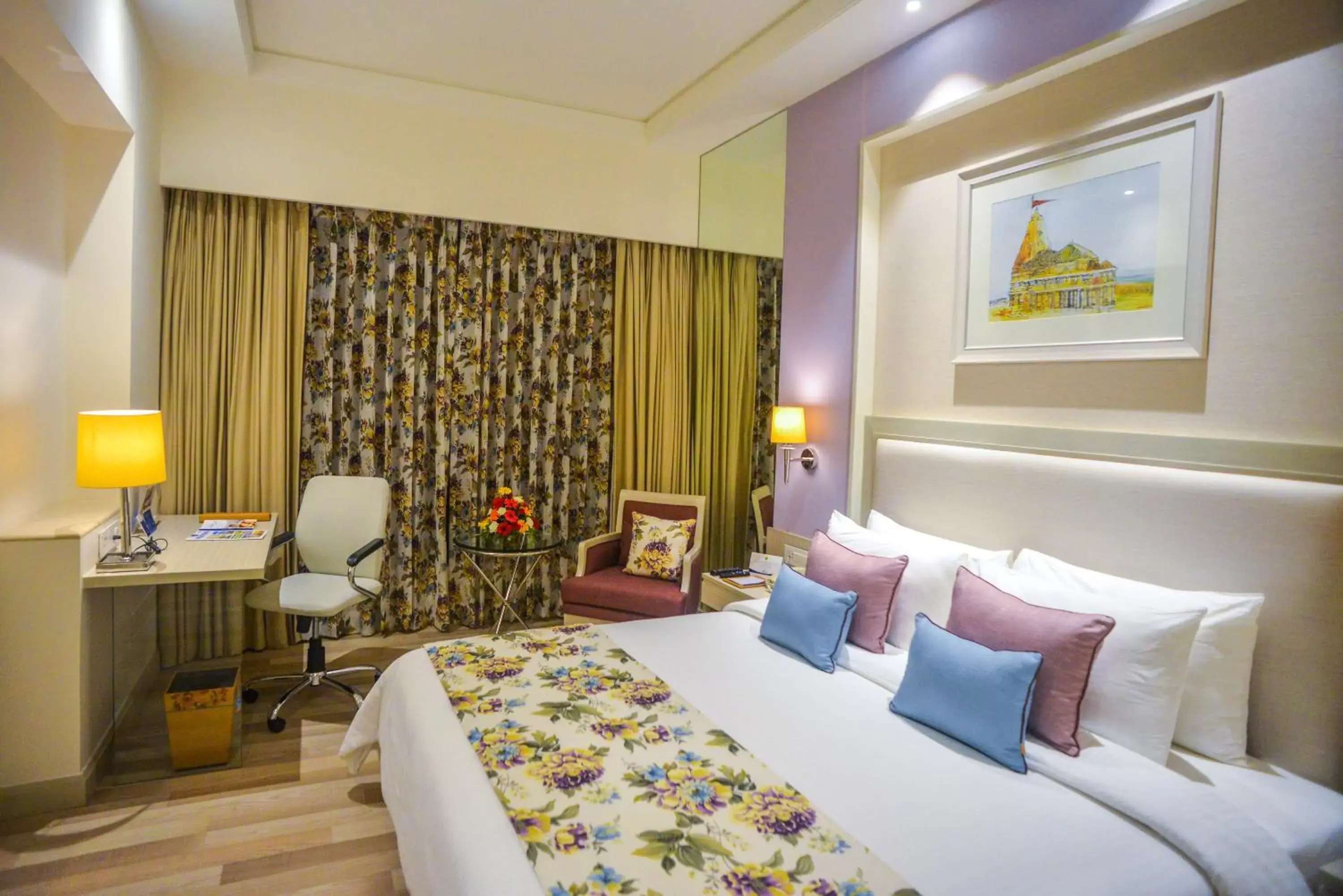 Bedroom, Bed in Efcee Sarovar Premiere Bhavnagar