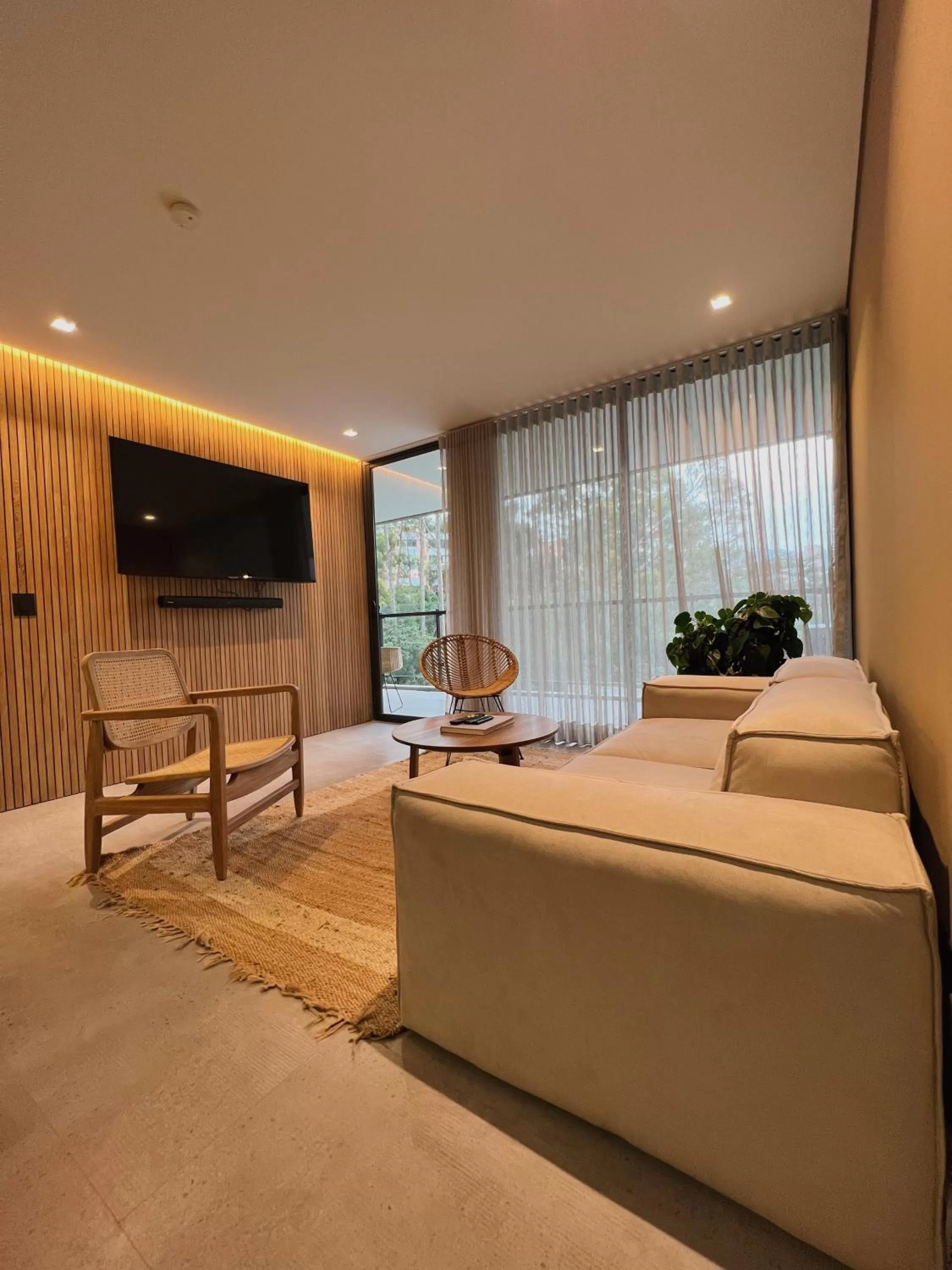 Communal lounge/ TV room, Bed in Wake Living