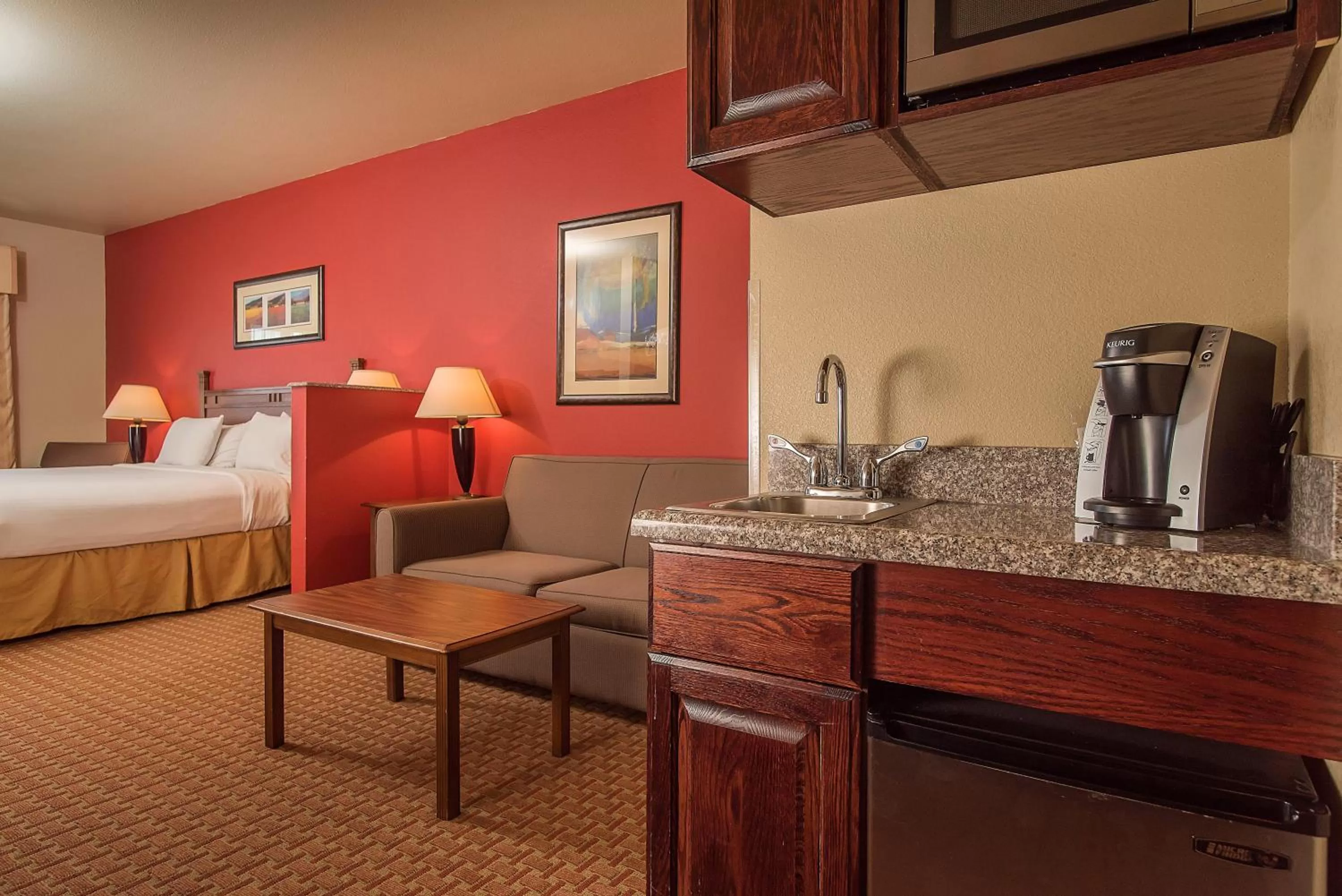 Bed in Baymont Inn & Suites by Wyndham Sturgis