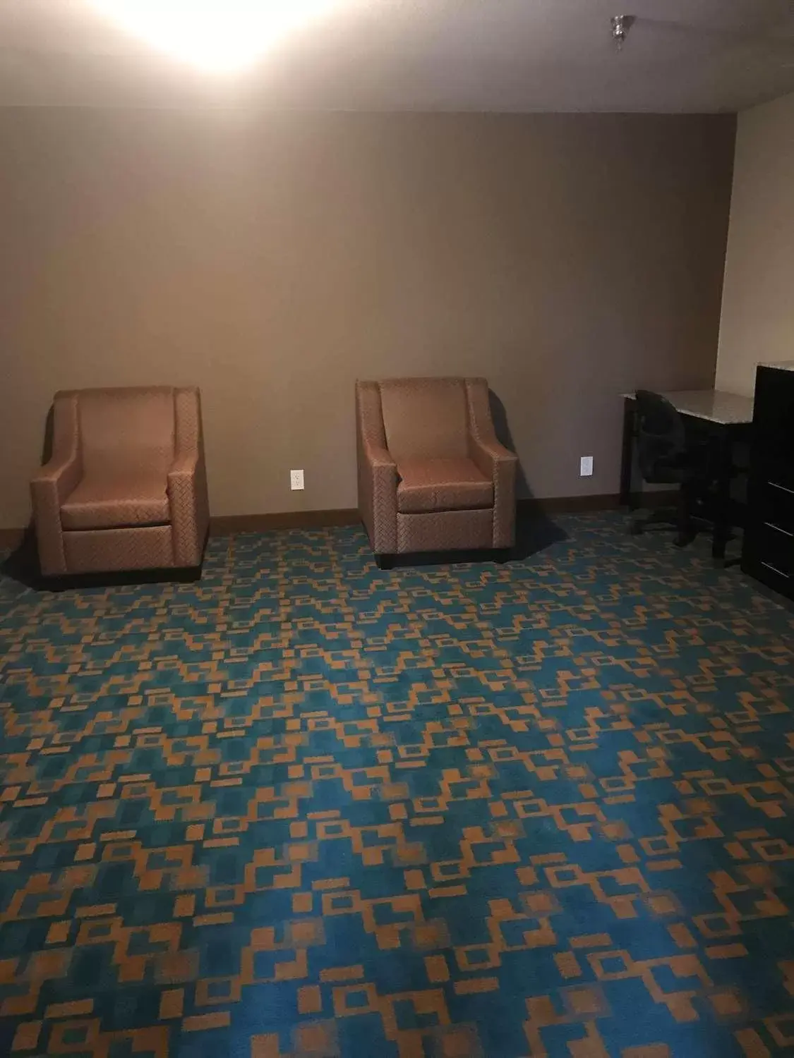 Seating area, Bed in SureStay Hotel by Best Western Brownsville