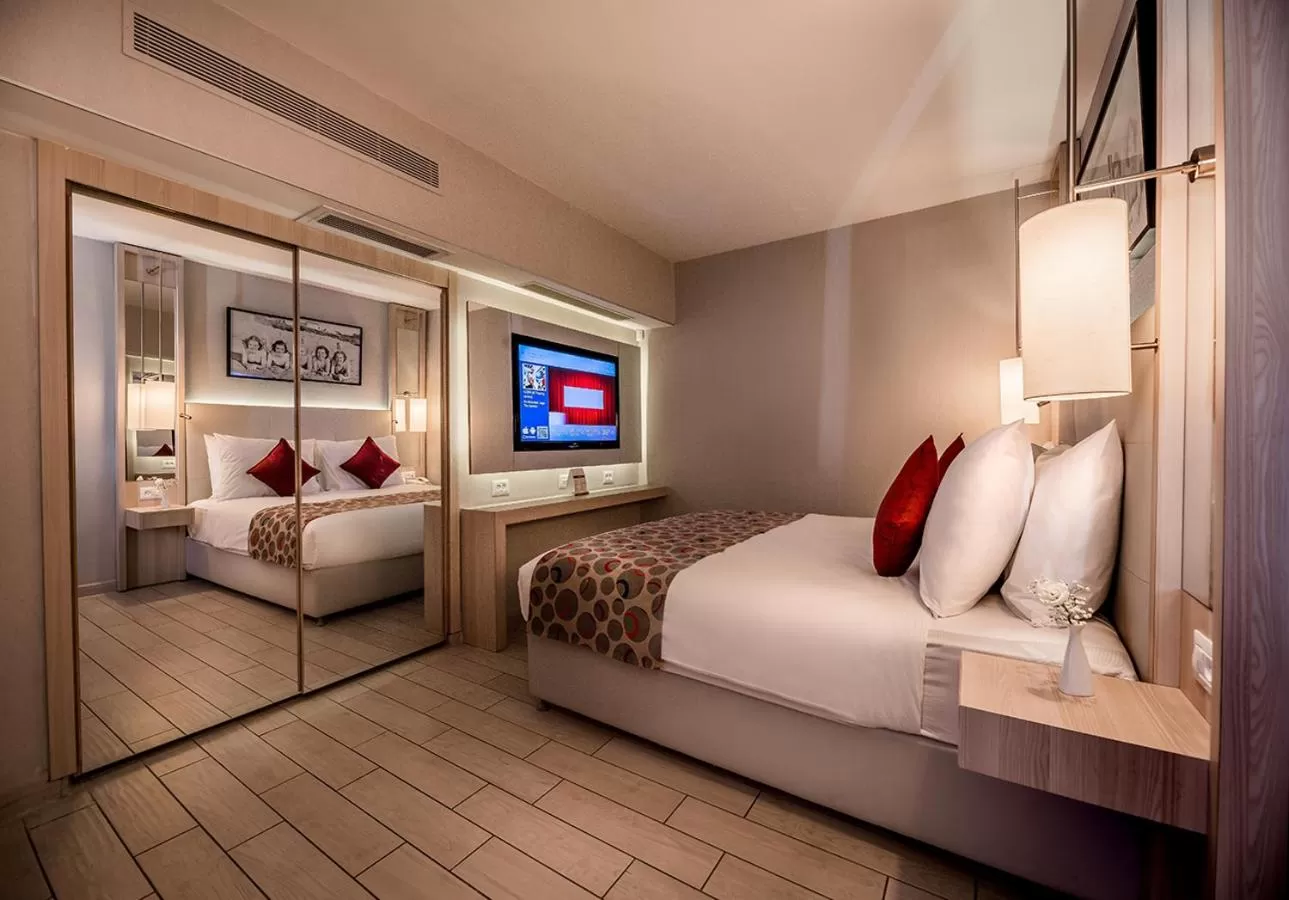 Bed in Astral Maris Hotel