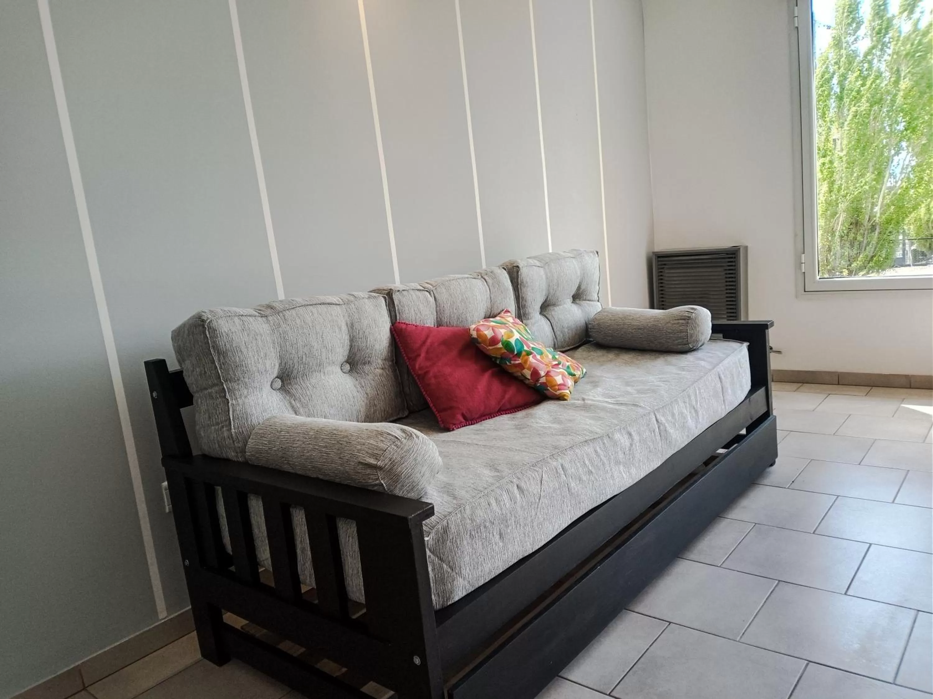 Living room, Bed in Flamenco Bay Apartments