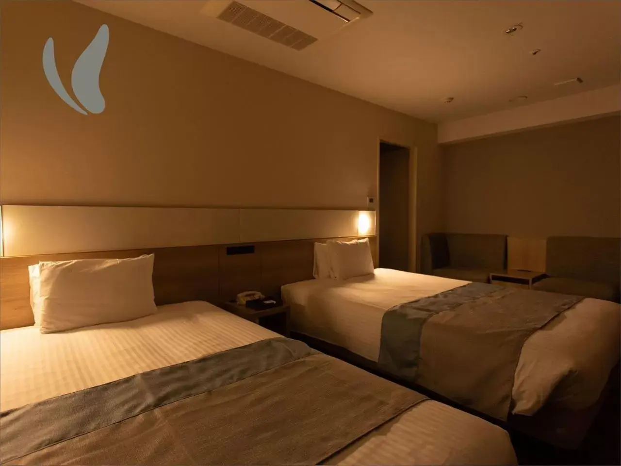 Photo of the whole room, Bed in Hotel Hokke Club Naha Shintoshin