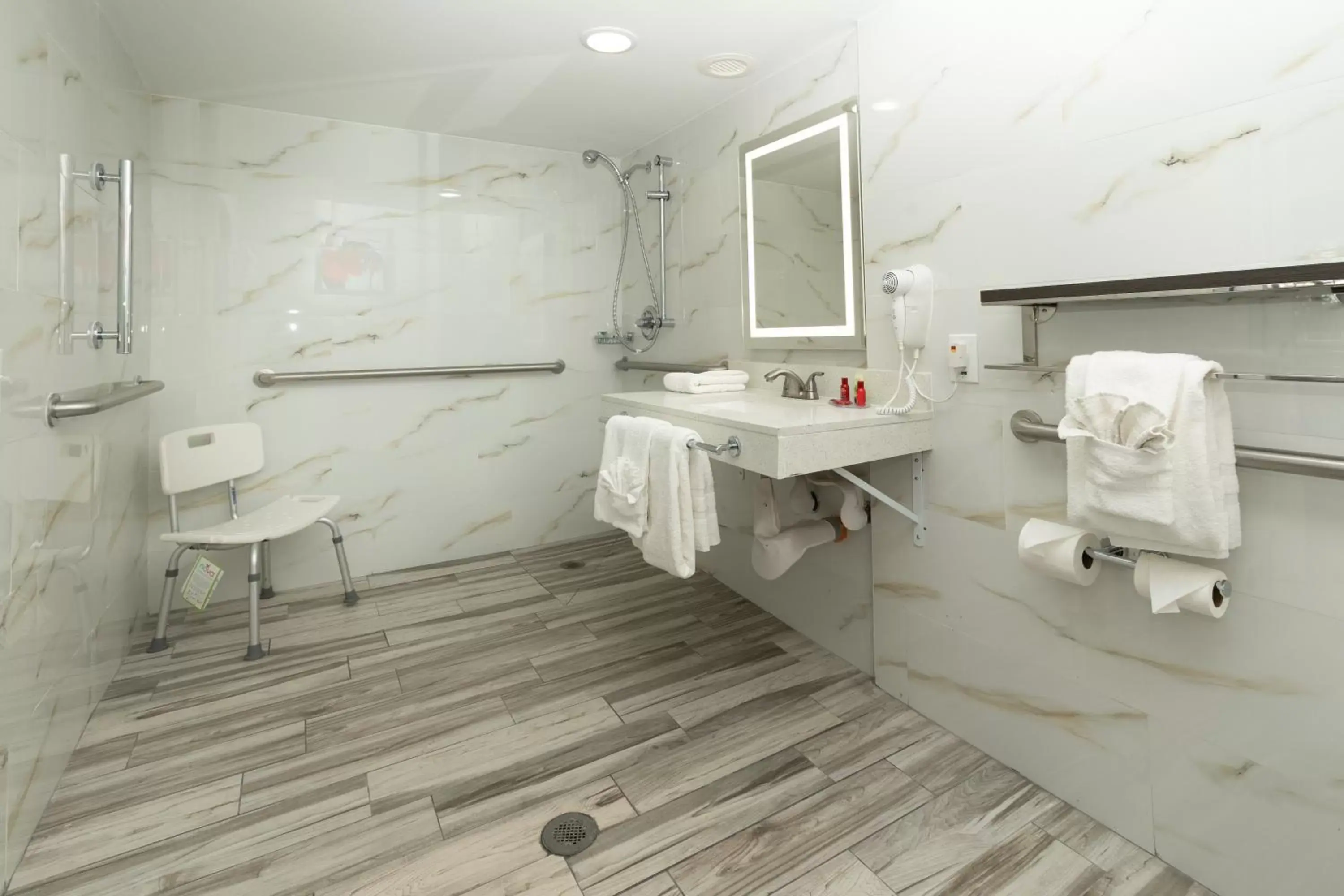 Bathroom in SureStay Plus Hotel by Best Western Sacramento Cal Expo