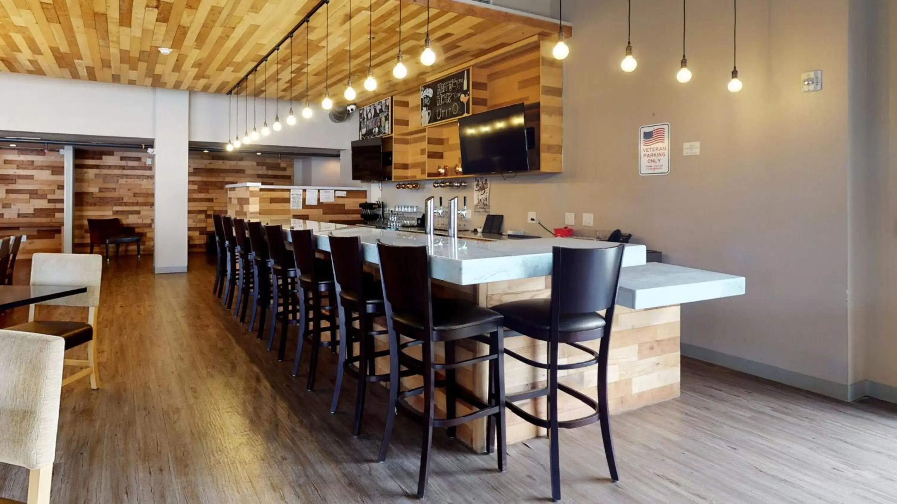 Lobby or reception, Restaurant/Places to Eat in Aggieland Boutique Hotel