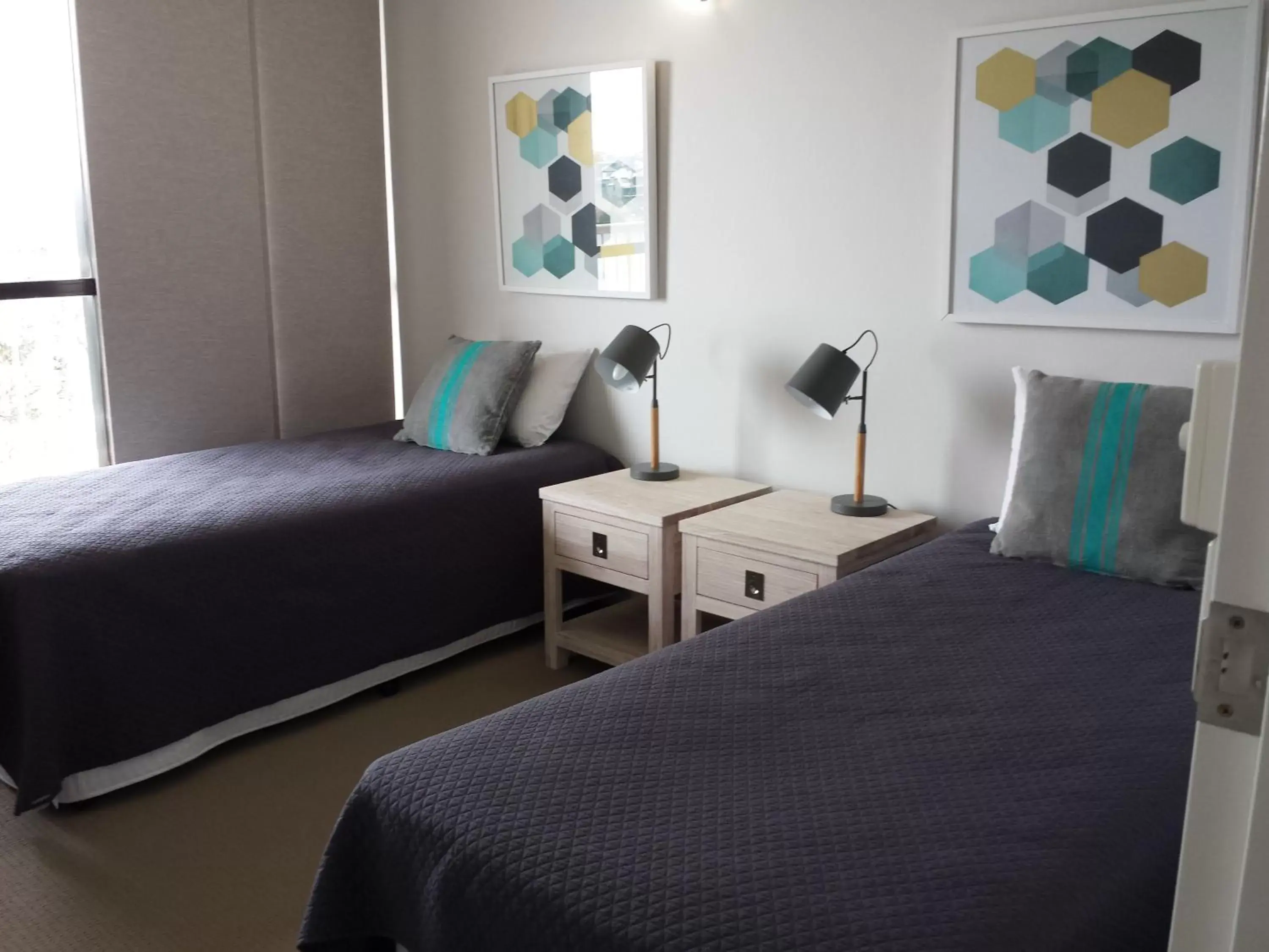 Bed in Kirribilli Apartments