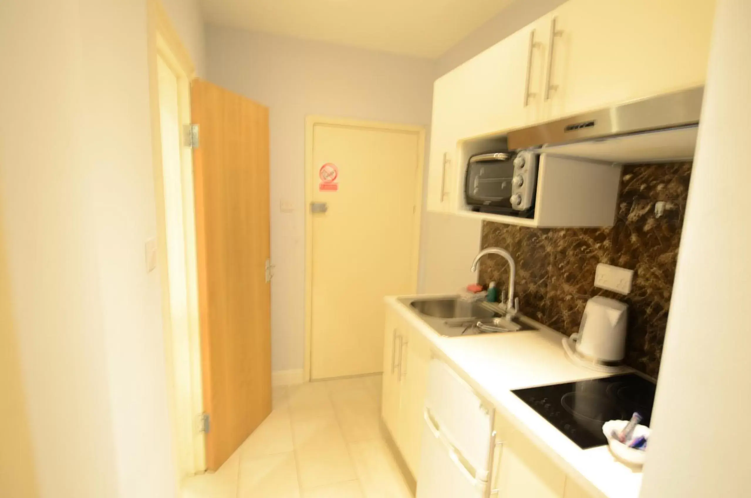 Bedroom, Kitchen/Kitchenette in Amber Residence Aparthotel