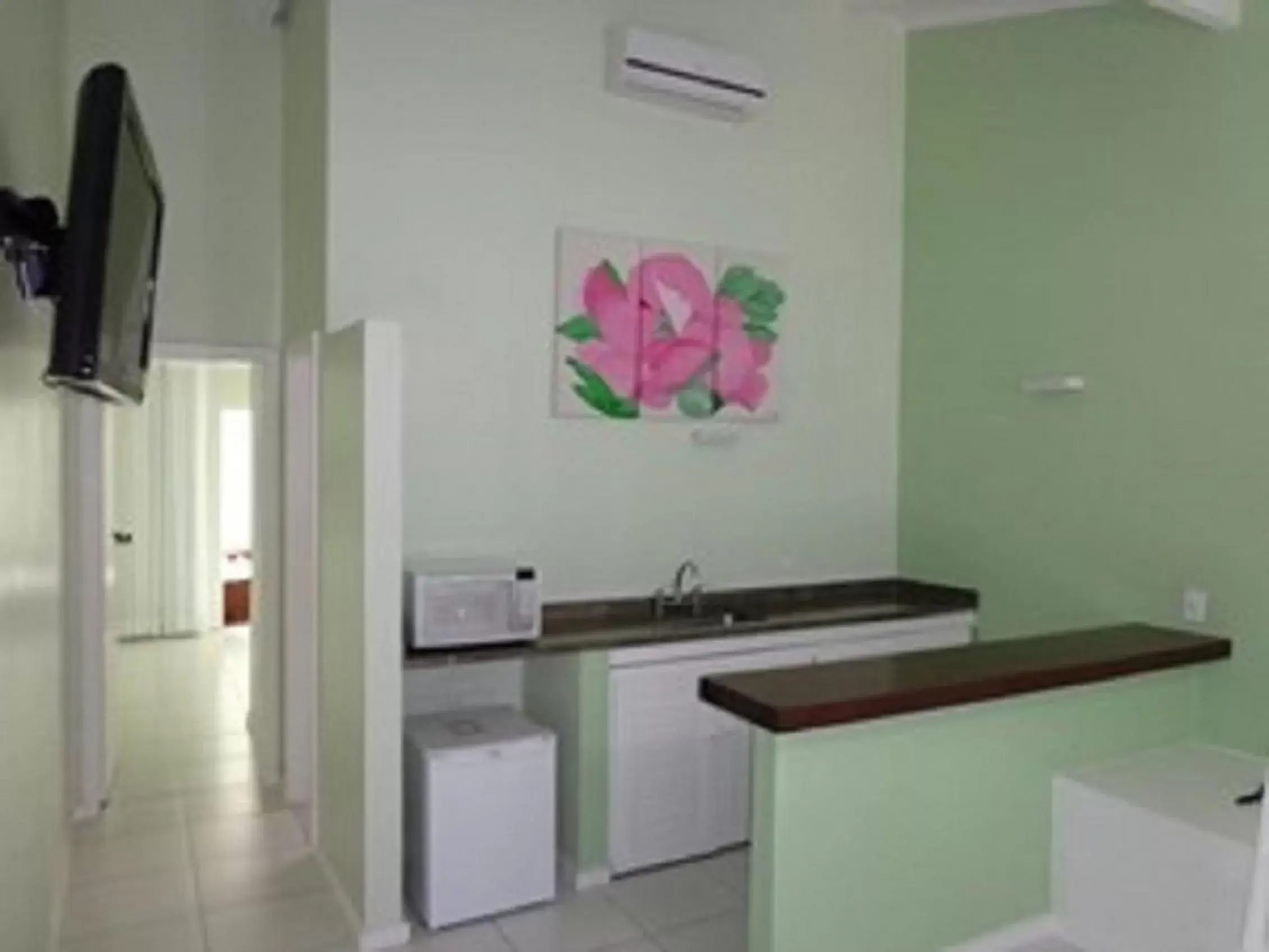 Bedroom, Kitchen/Kitchenette in Pousada dos Reis