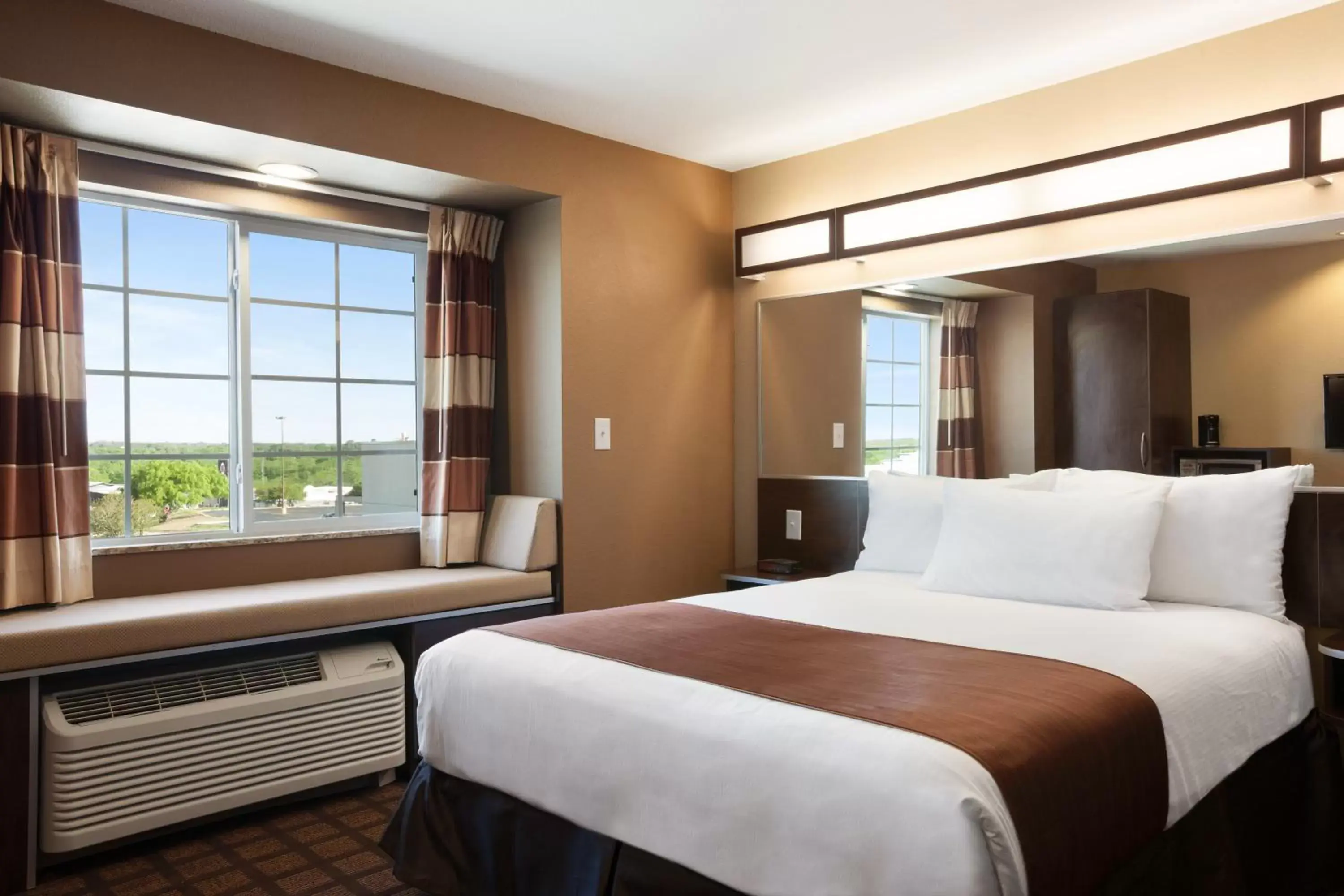 Bed in Microtel Inn & Suites Pleasanton
