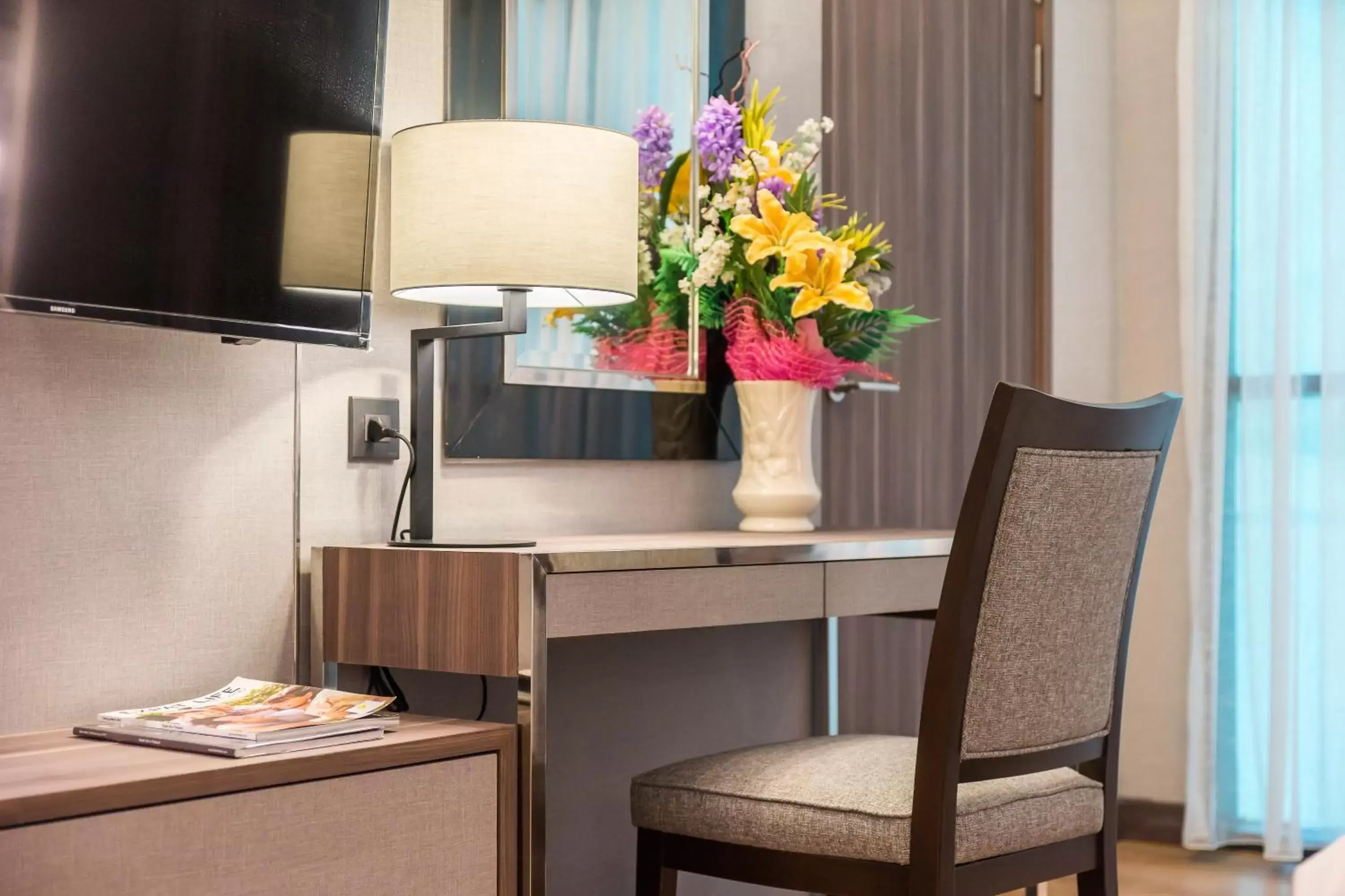 Seating area, TV/Entertainment Center in Citrus Suites Sukhumvit 6 by Compass Hospitality