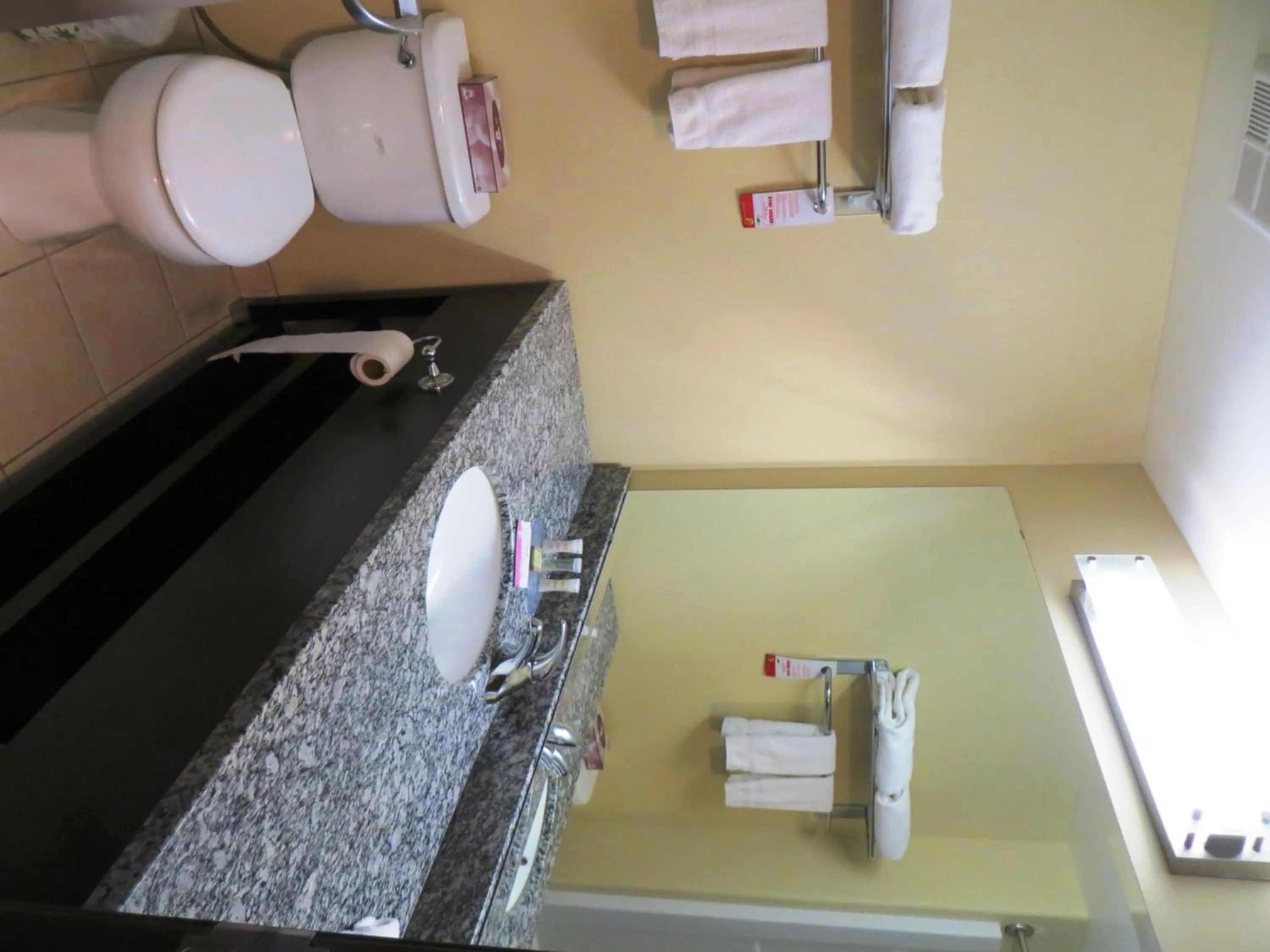 Bathroom in Super 8 by Wyndham Saskatoon Near Downtown